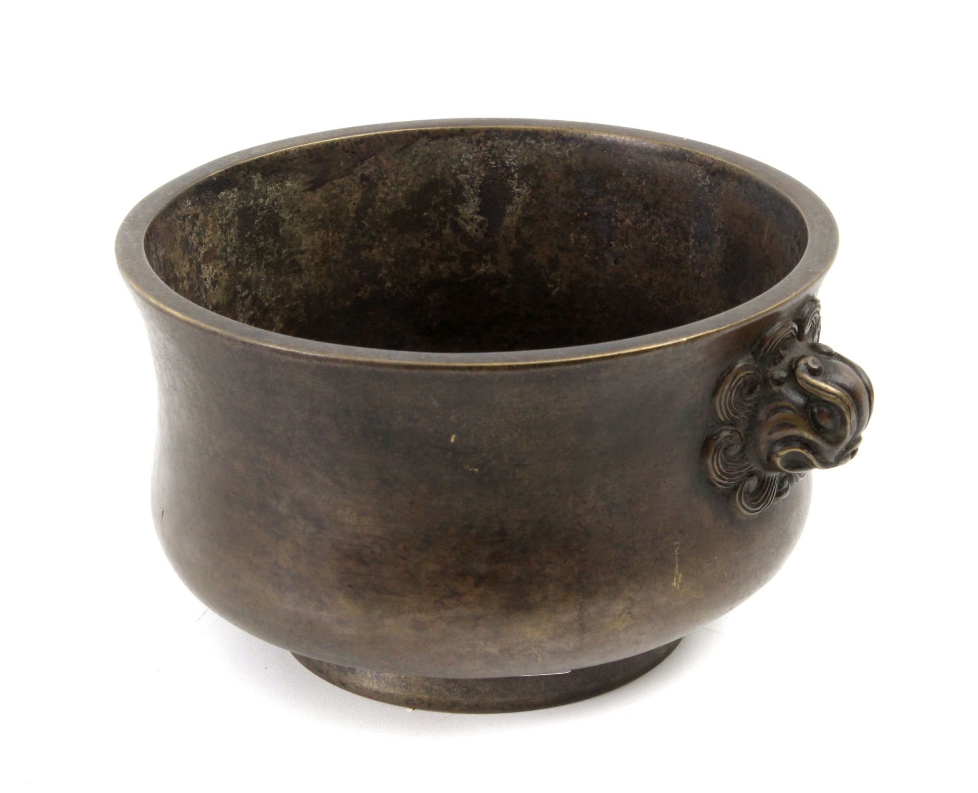 A 20th century gilt bronze cauldron