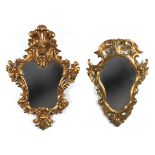 A pair of 20th century Louis XV style cornucopia mirrors