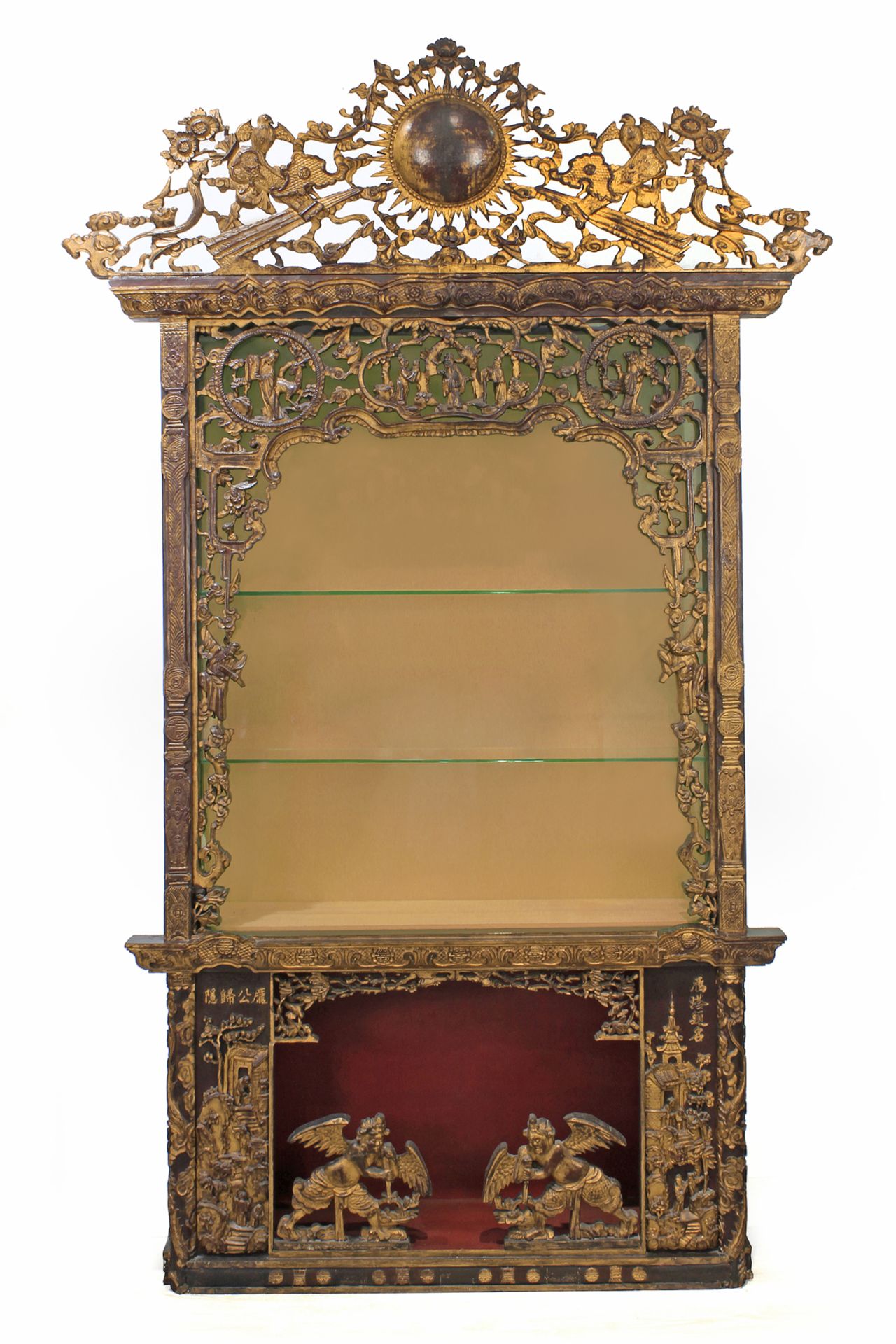 A late 19th century Chinese carved and polychromed wood glass cabinet