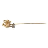 A first third of the 20th century tie pin with an 18 k. yellow gold setting and rose cut diamonds