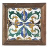 A 16th century plaque with four probably Aragonese showing tiles