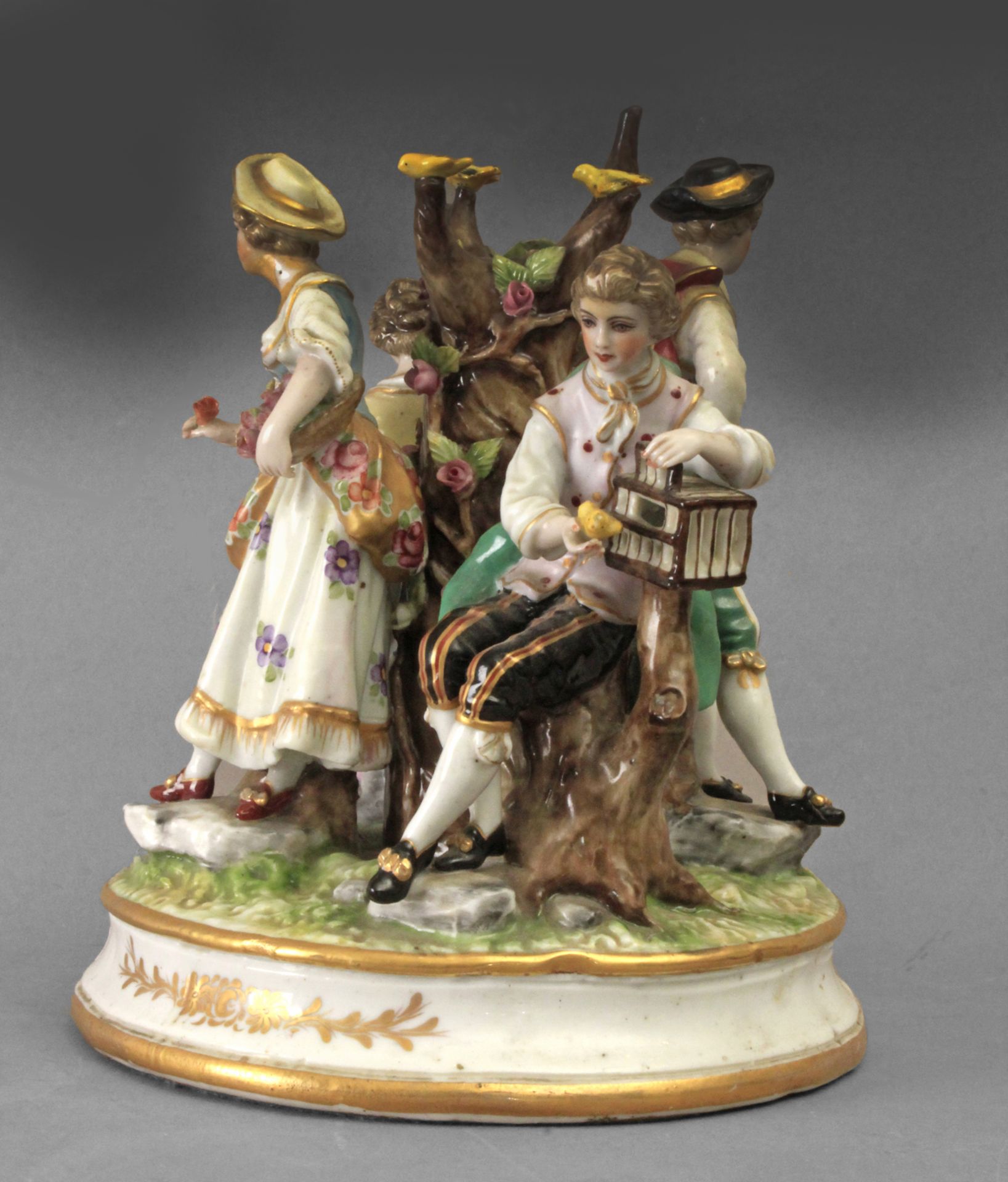 A 19th century group of figurines in European porcelain