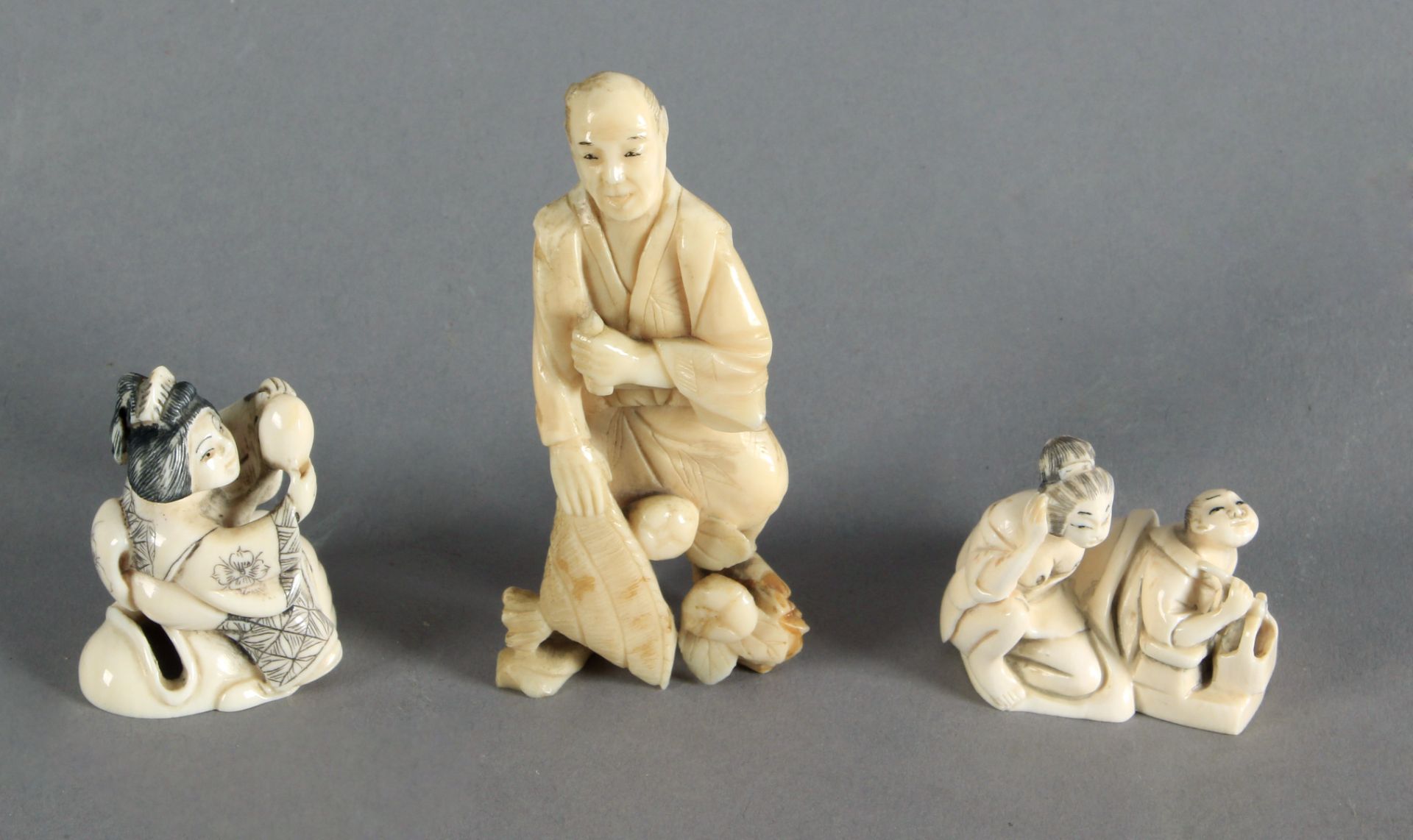 Early 19th century three Japanese netsukes in carved ivory