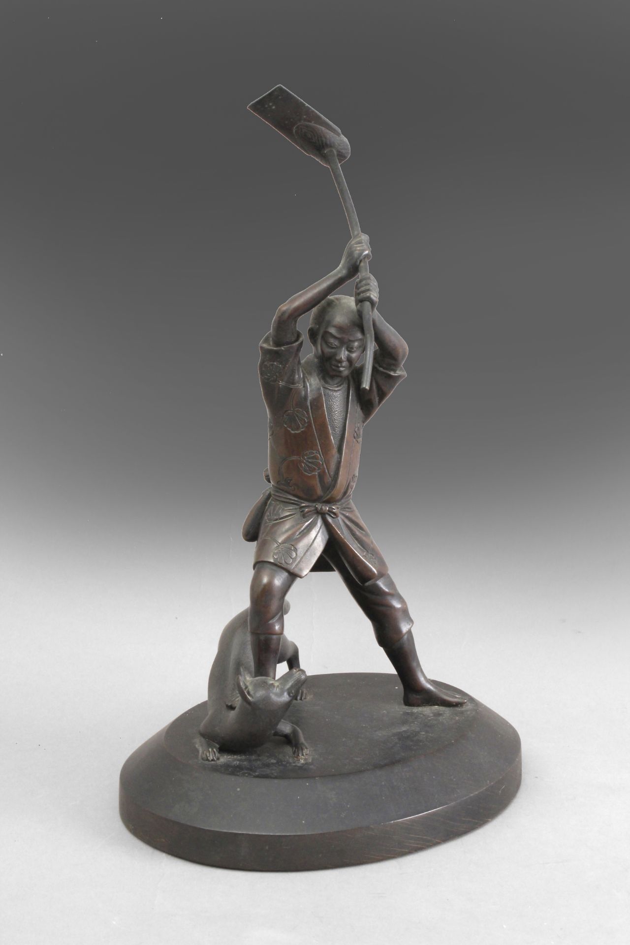 19th century Japanese school. A bronze sculpture of a peasant from Meiji period