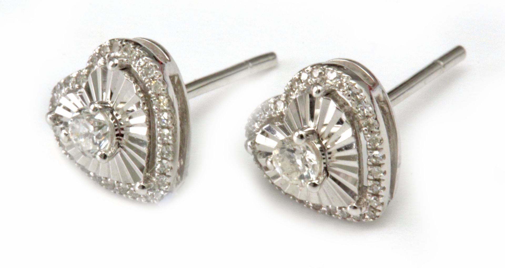 A pair of diamond heart shaped stud earrings with an 18 k. white gold setting - Image 2 of 2