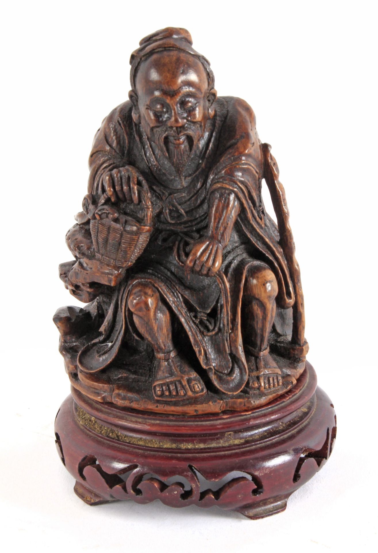 Early 20th century Chinese school. Sculpture of an old man in carved bamboo