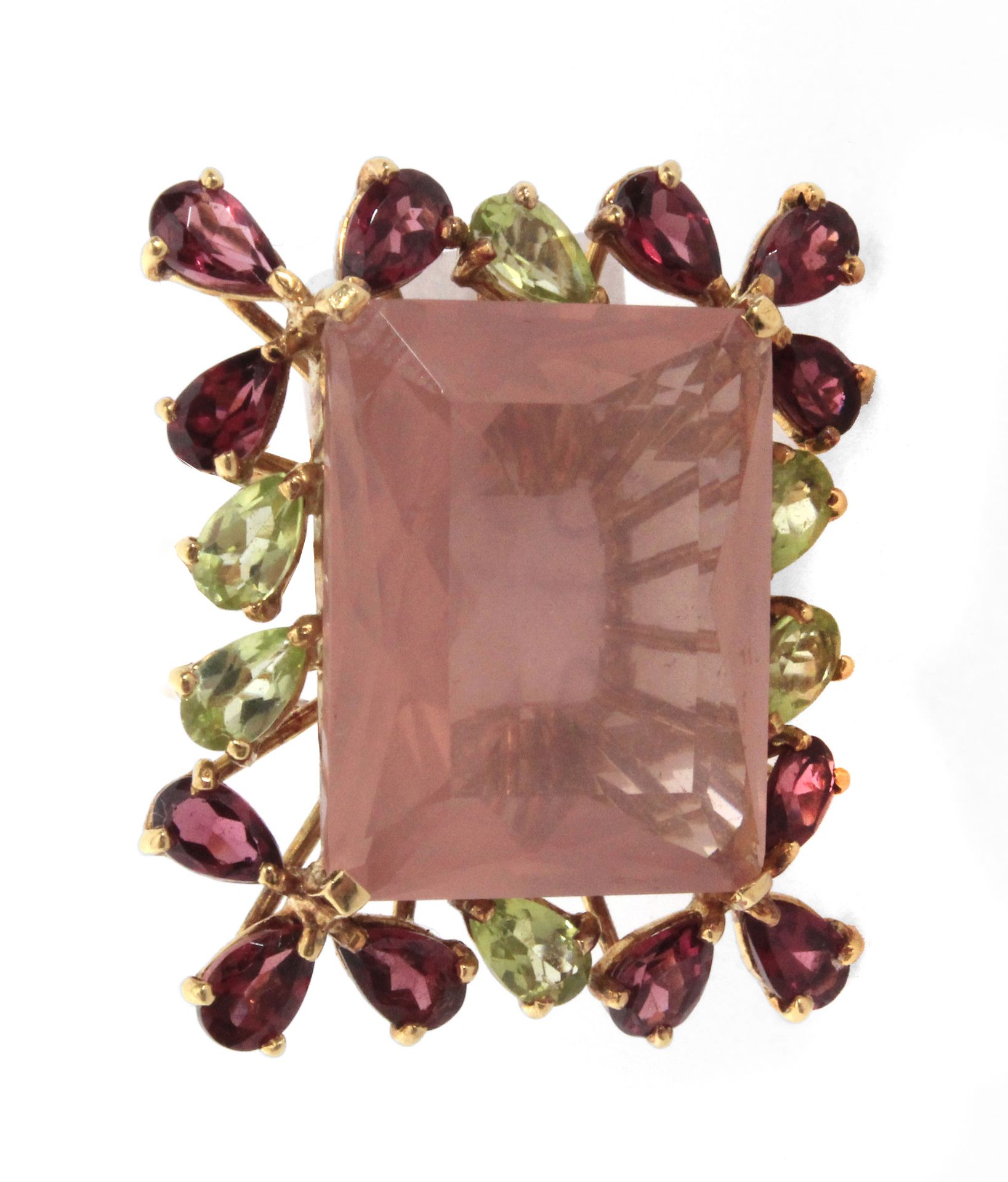 An 18 k. yellow gold ring with rose quartz, peridots and garnets