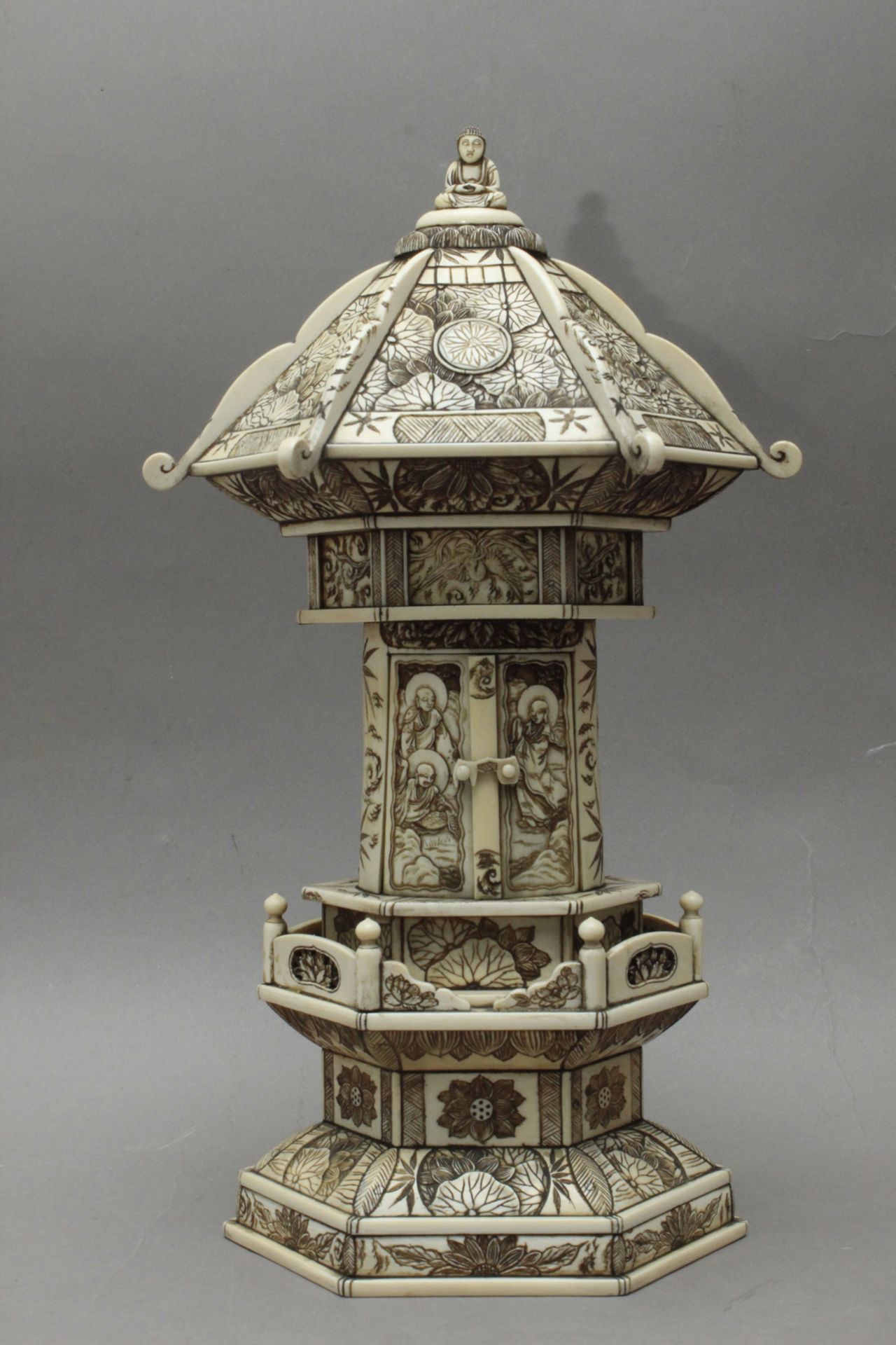 Late 19th century-early 20th century Japanese school. A carved ivory Buddhist shrine