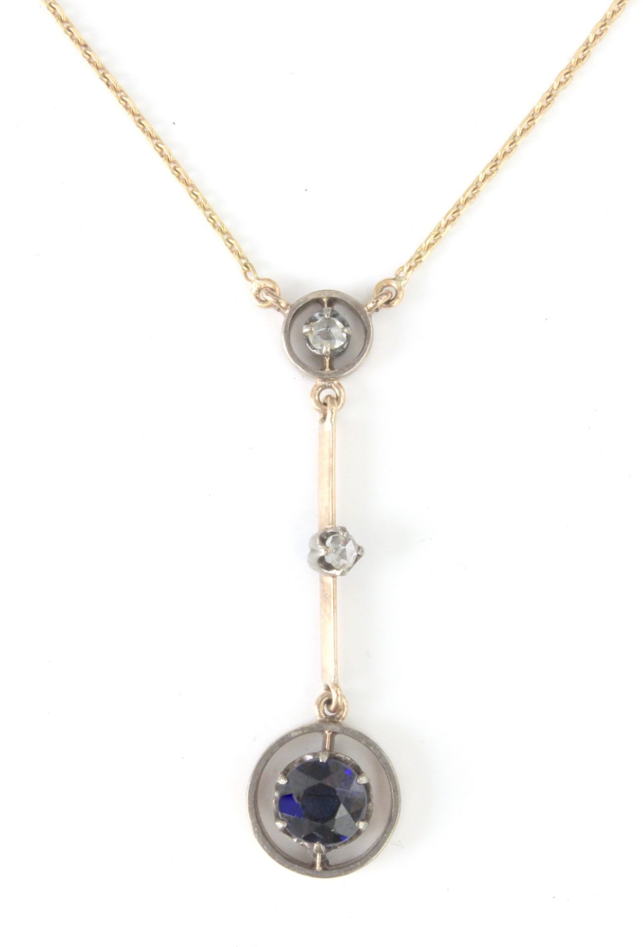 A first half of 20th century sapphire pendant with an 18 k. yellow gold setting