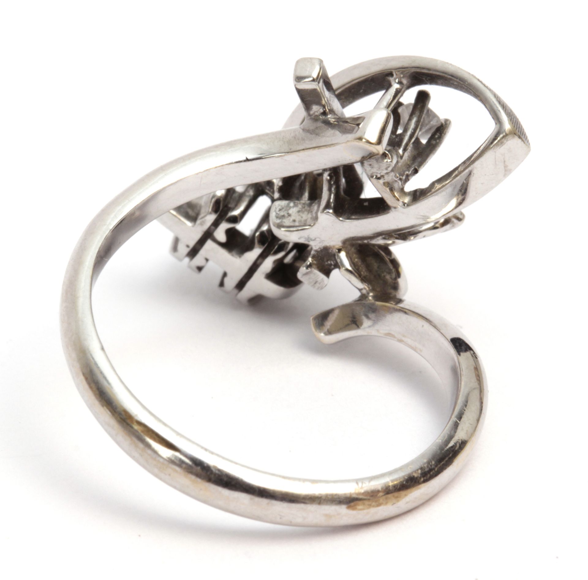 A brilliant cut diamond flowery ring in an 18 k. white gold setting - Image 2 of 2