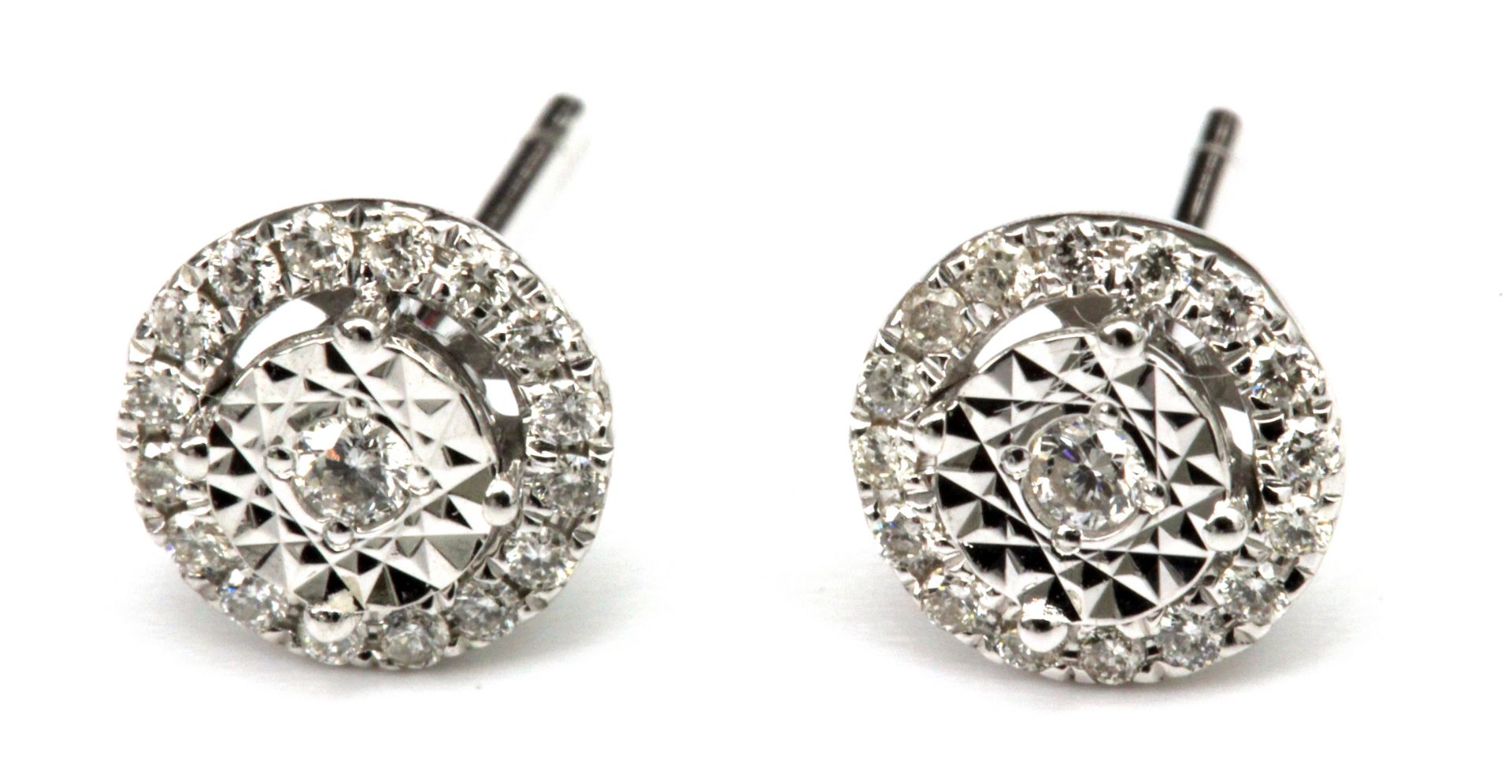 A pair of diamond cluster stud earrings with an 18 k. white gold setting