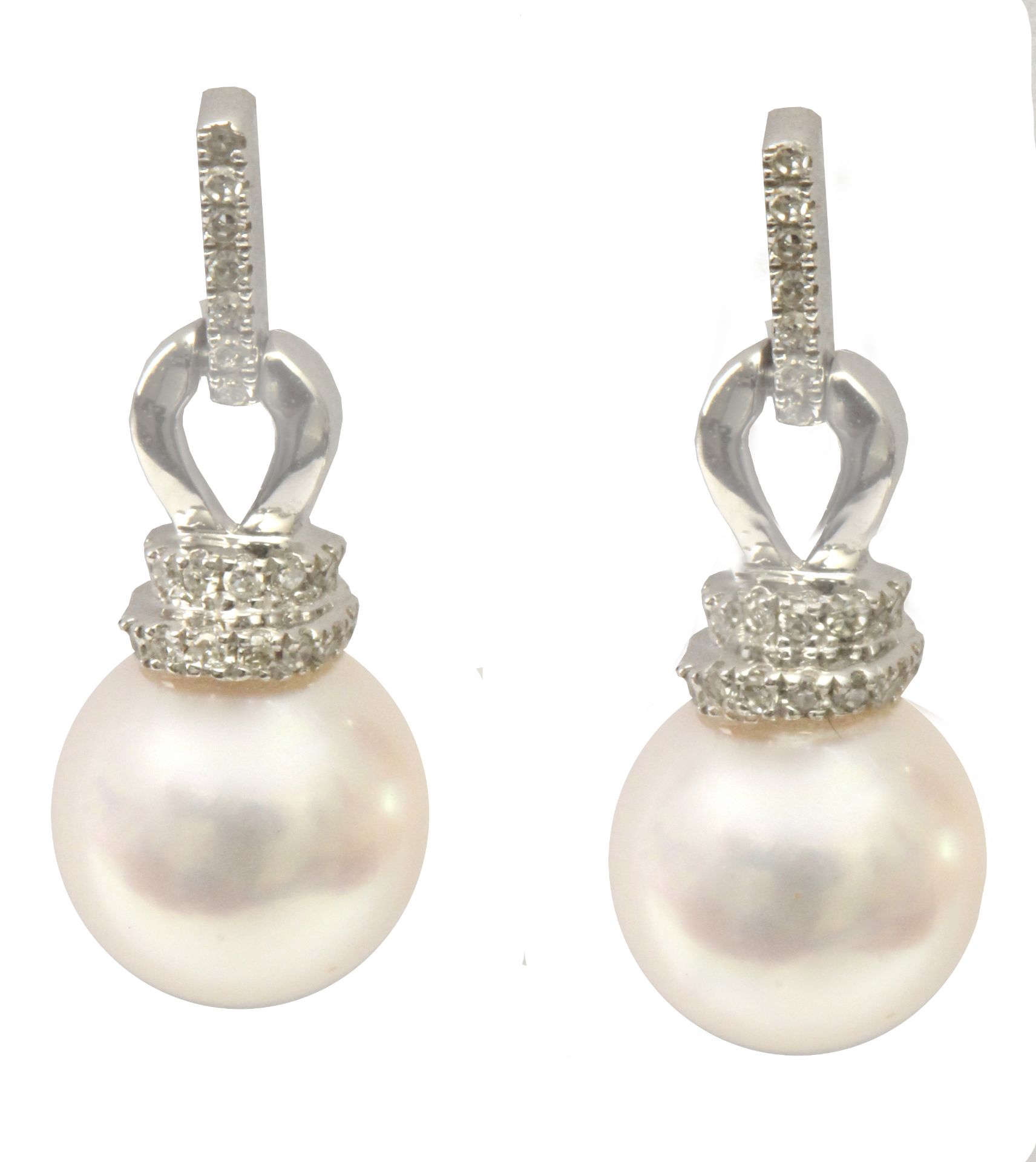 A pair of diamond and pearl long earrings with an 18 k. white gold setting