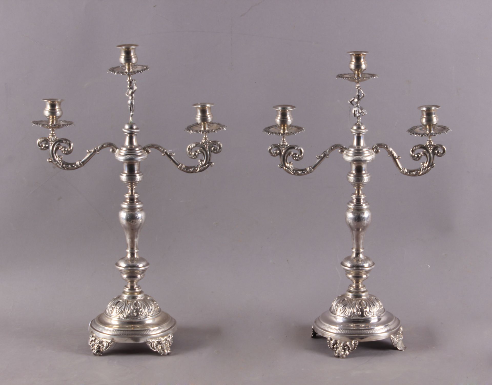 A pair of 19th century silver candelabras