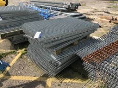 Galvanised Steel Wire Mesh Floor Panels, as set out in one stack