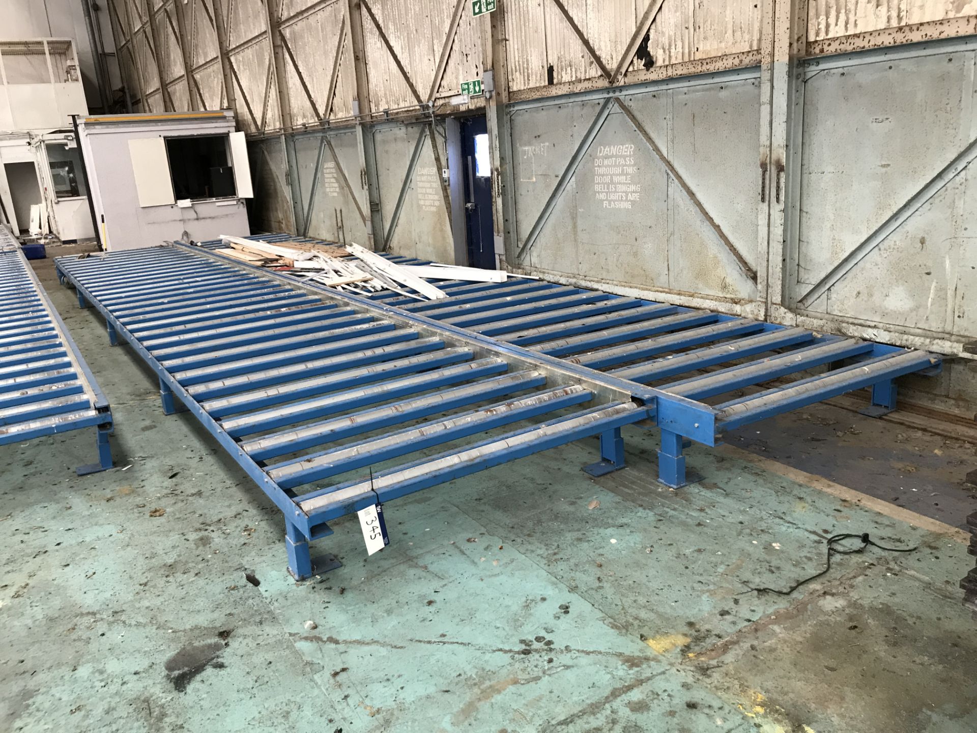 Two Powered Roller Conveyors, up to approx. 1.7m wide on rollers x 12m long (please note – both