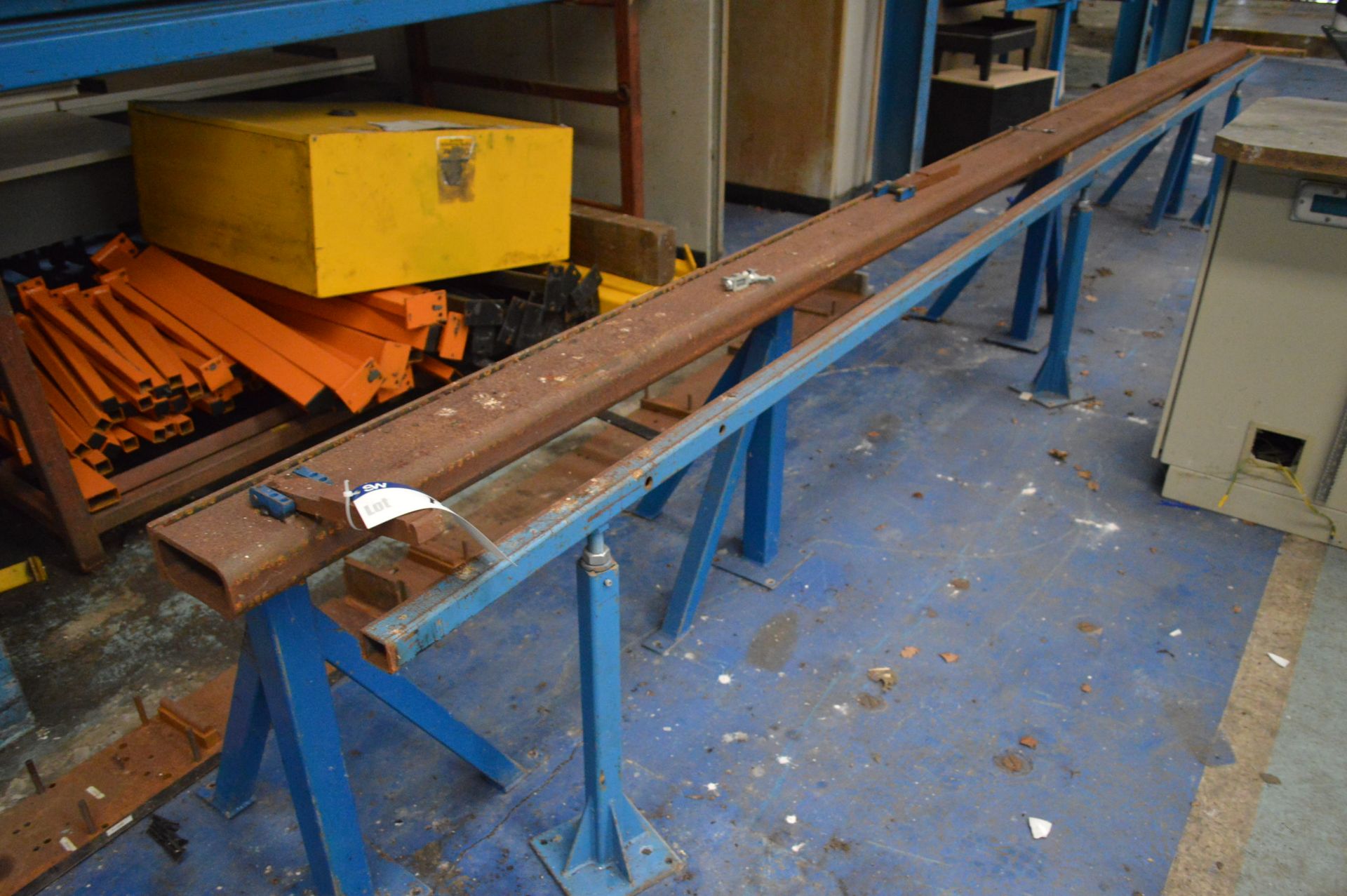Fabricated Steel Work Stop, approx. 5.5m long, with fabricated stand to front