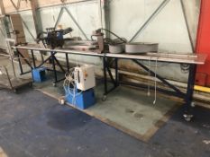 Hand Operated Punch/ Press, with railing and mobile steel framed bench, approx. 4.8m long