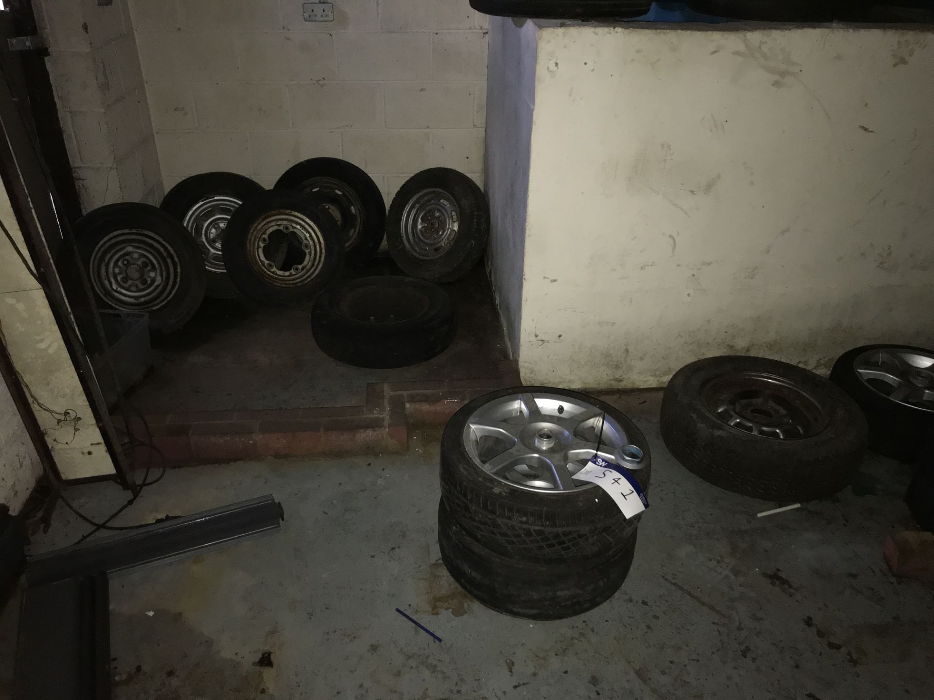 Assorted Car Tyres, as set out in corner of room