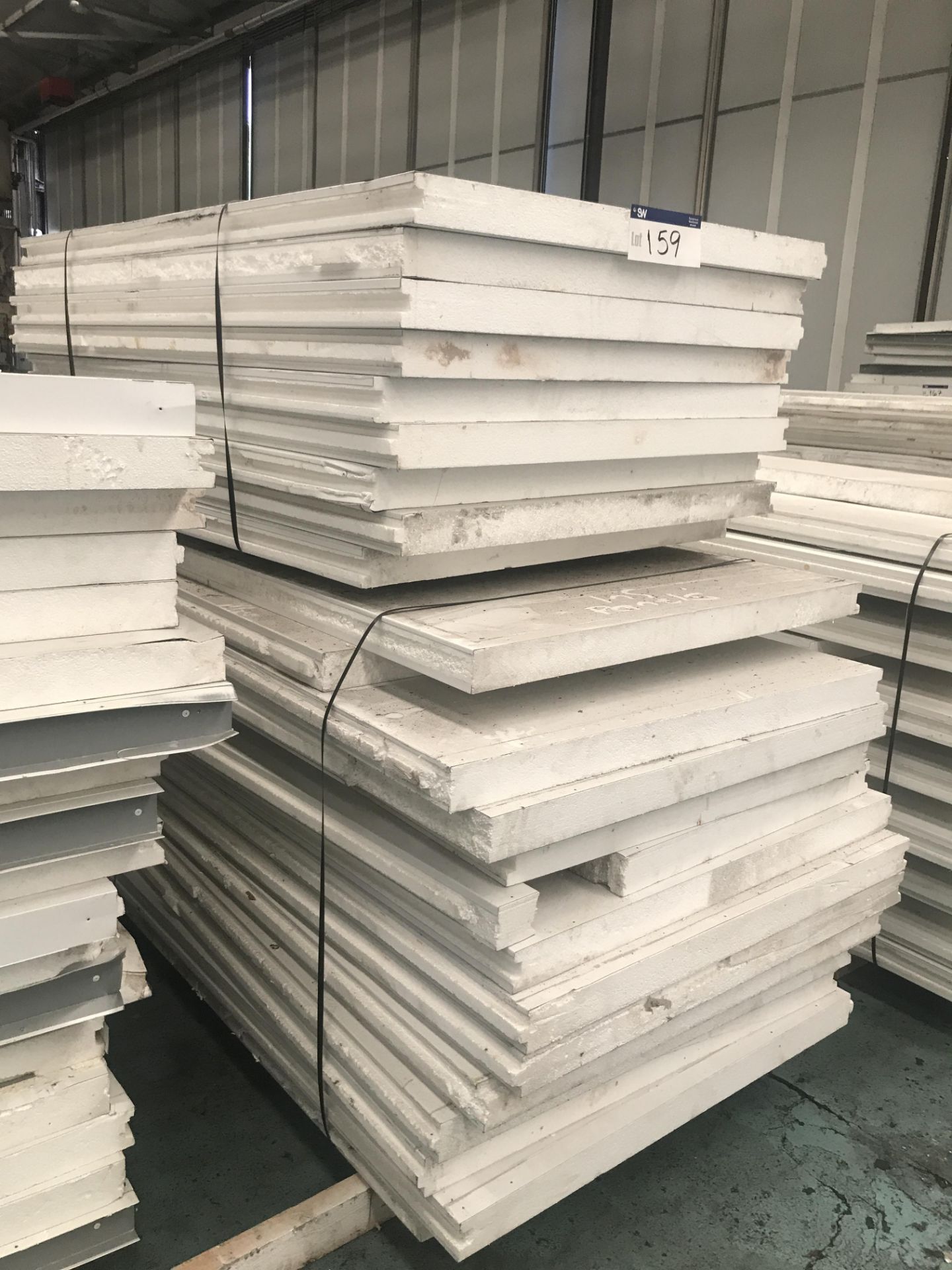 Assorted Insulated Board, up to 2.6m long, as set out in stack