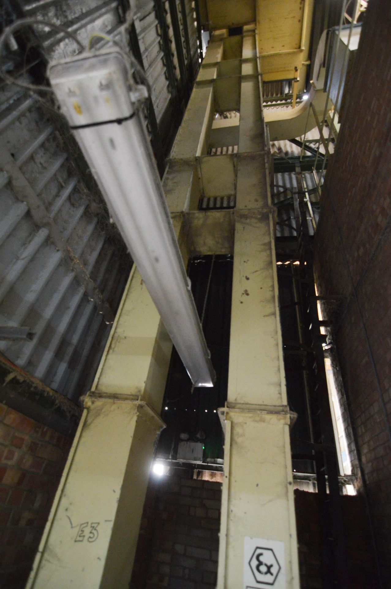 APPROX. 275mm BELT & BUCKET ELEVATOR, approx. 13m centres high, with electric motor and shaft - Image 2 of 3