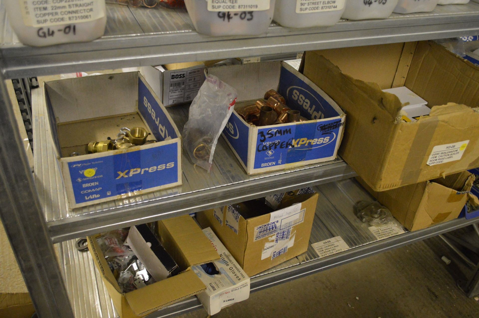 STOCK CONTENTS ON FOUR RACKS, comprising copper, brass pipe fittings, ceiling tapes, pipe clips, - Image 4 of 32