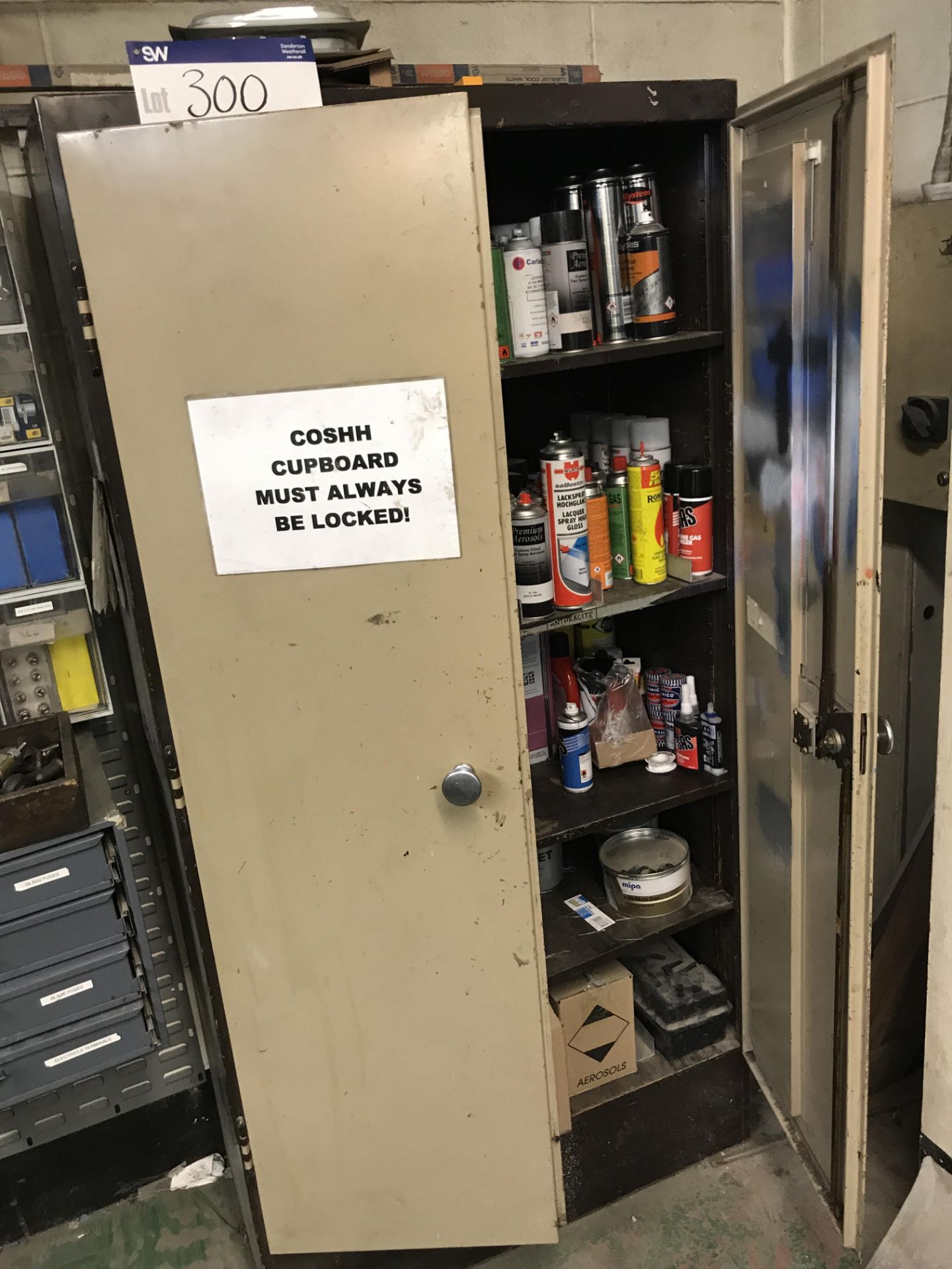 Double Door Steel Cupboard, with assorted lubricants and aerosols (lot located at Bedfords