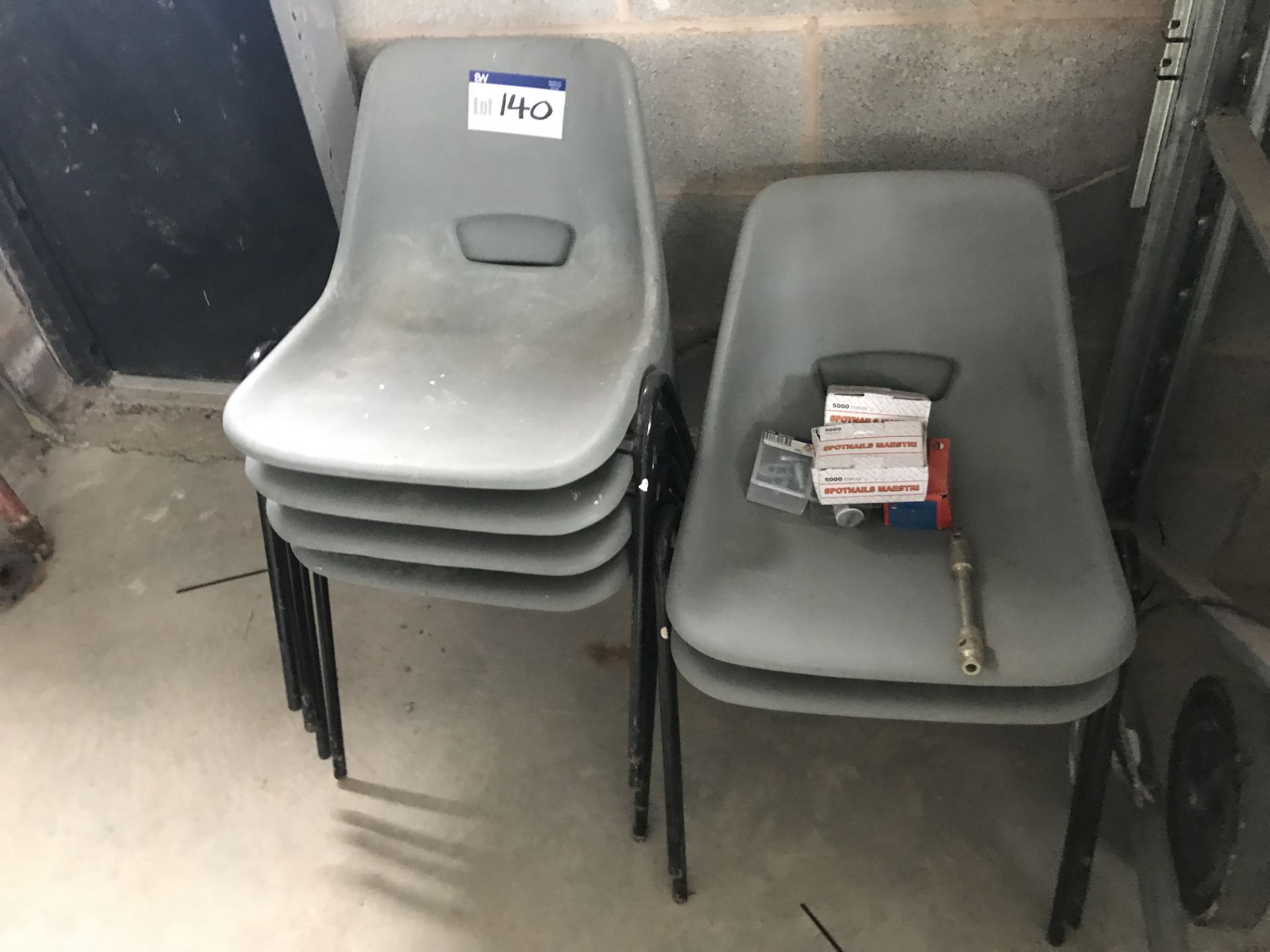 Six Plastic Stacking Chairs