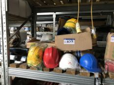 Assorted Hard Hats, as set out on one bay of rack