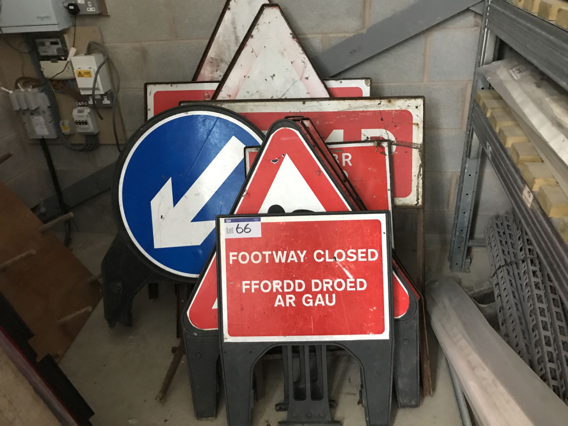 Assorted Road Signs, as set out against wall