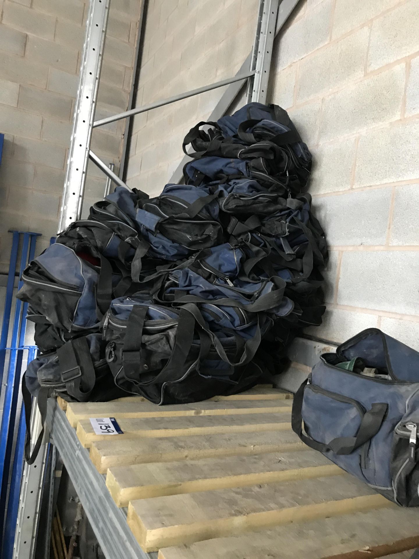 Assorted Duffle Bags, as set out on one bay of rack