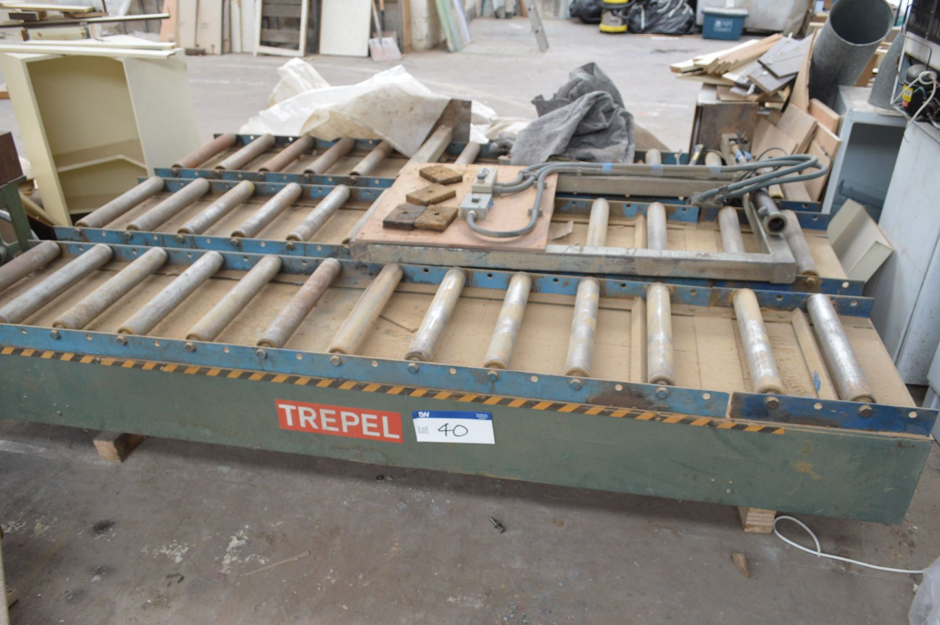 Trepel 9ft x 6ft Hydraulic Scissor Lift Table, with roller conveyoring fitted to top