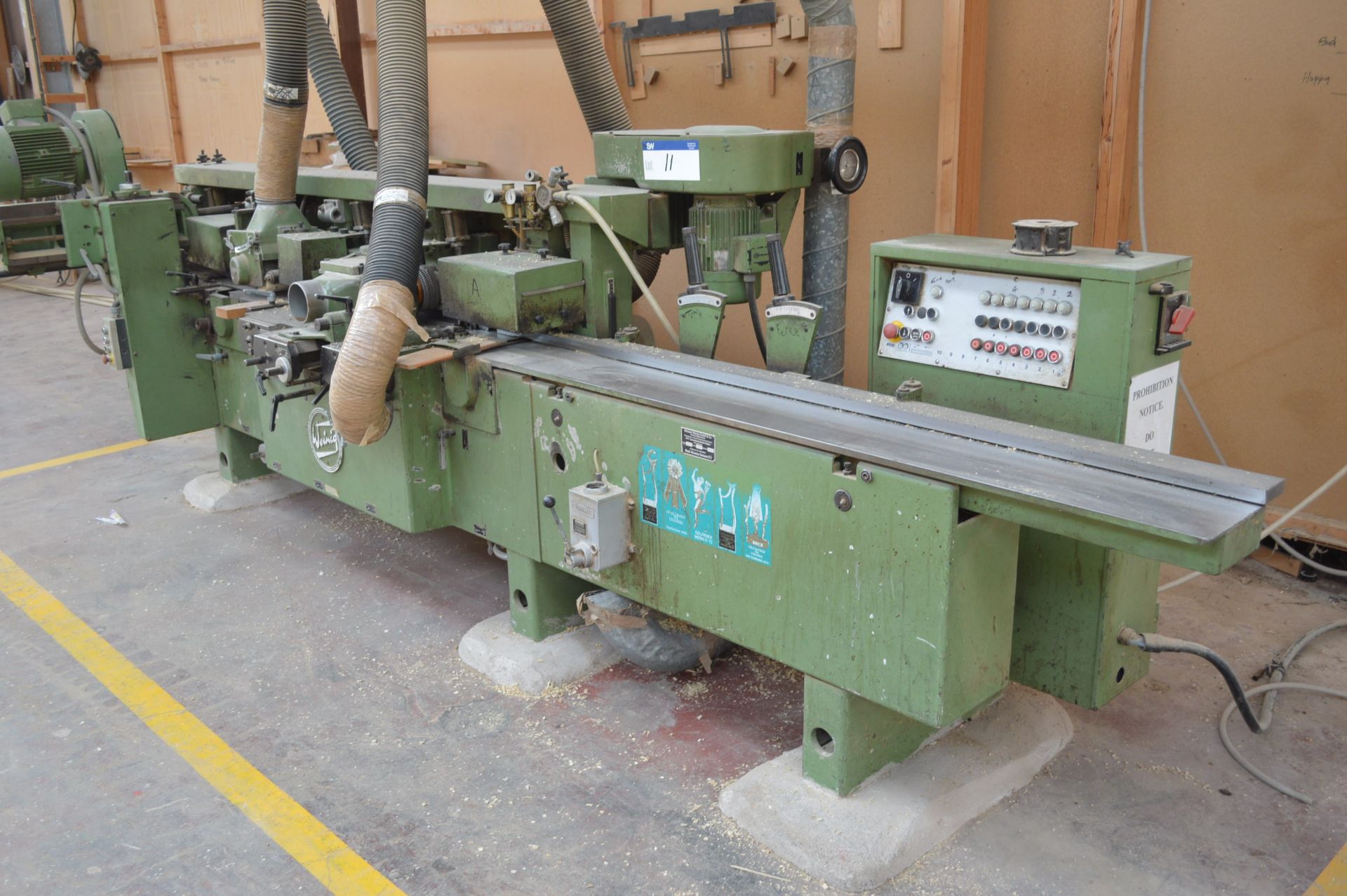 Weinig U17A 7-HEAD THROUGH FEED MOULDER, serial no. 1164/727, with extraction ducting to first 90°