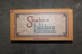 Three Snakes and Ladders Board Games