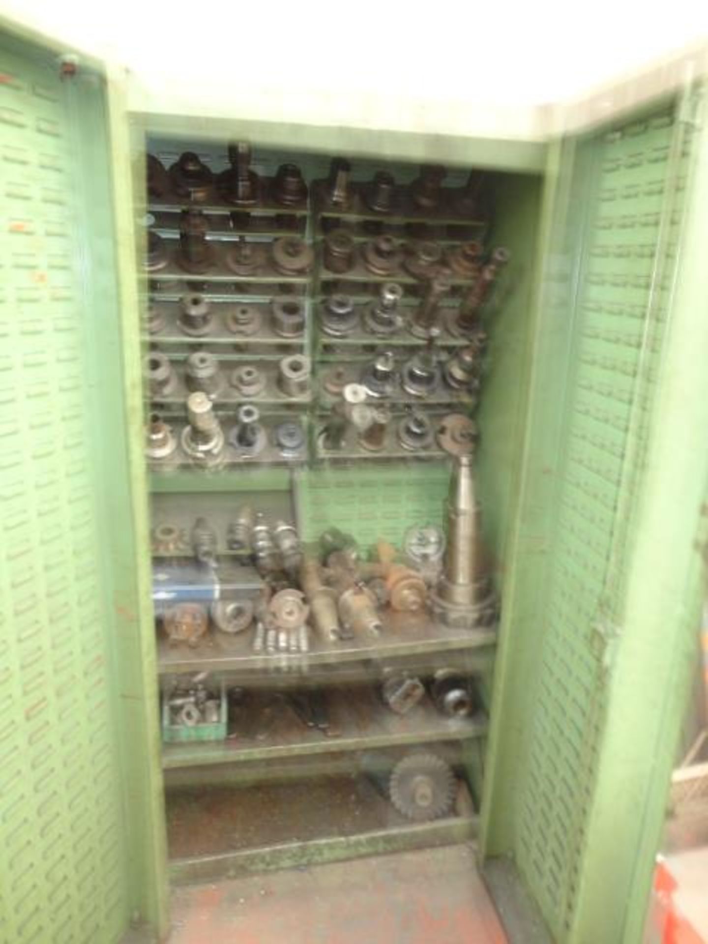 Assorted Tooling (understood to be for lot 521), with double door steel cabinet