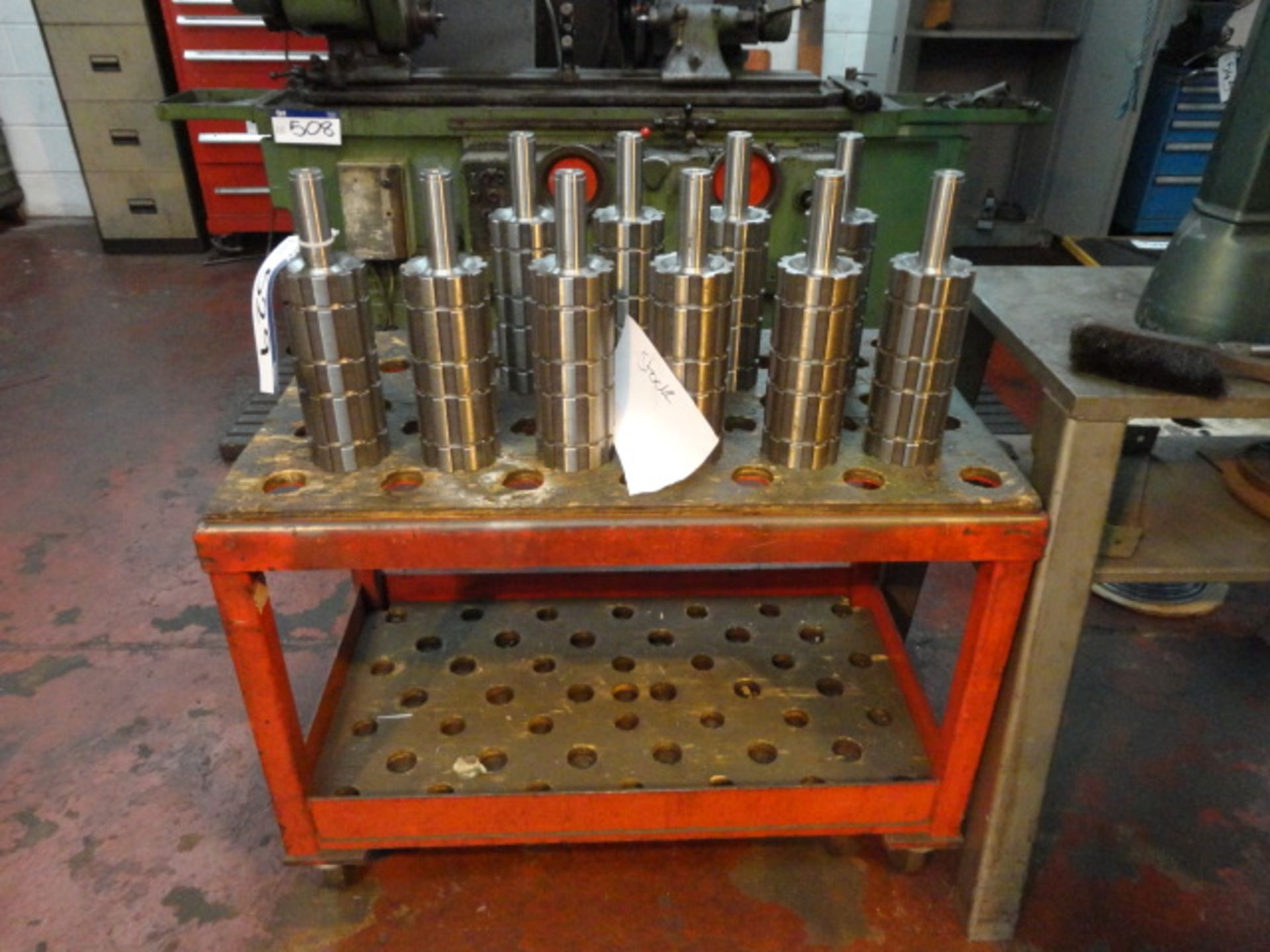 Approx. Ten Bearing Type Pistons, with steel framed two tier trolley