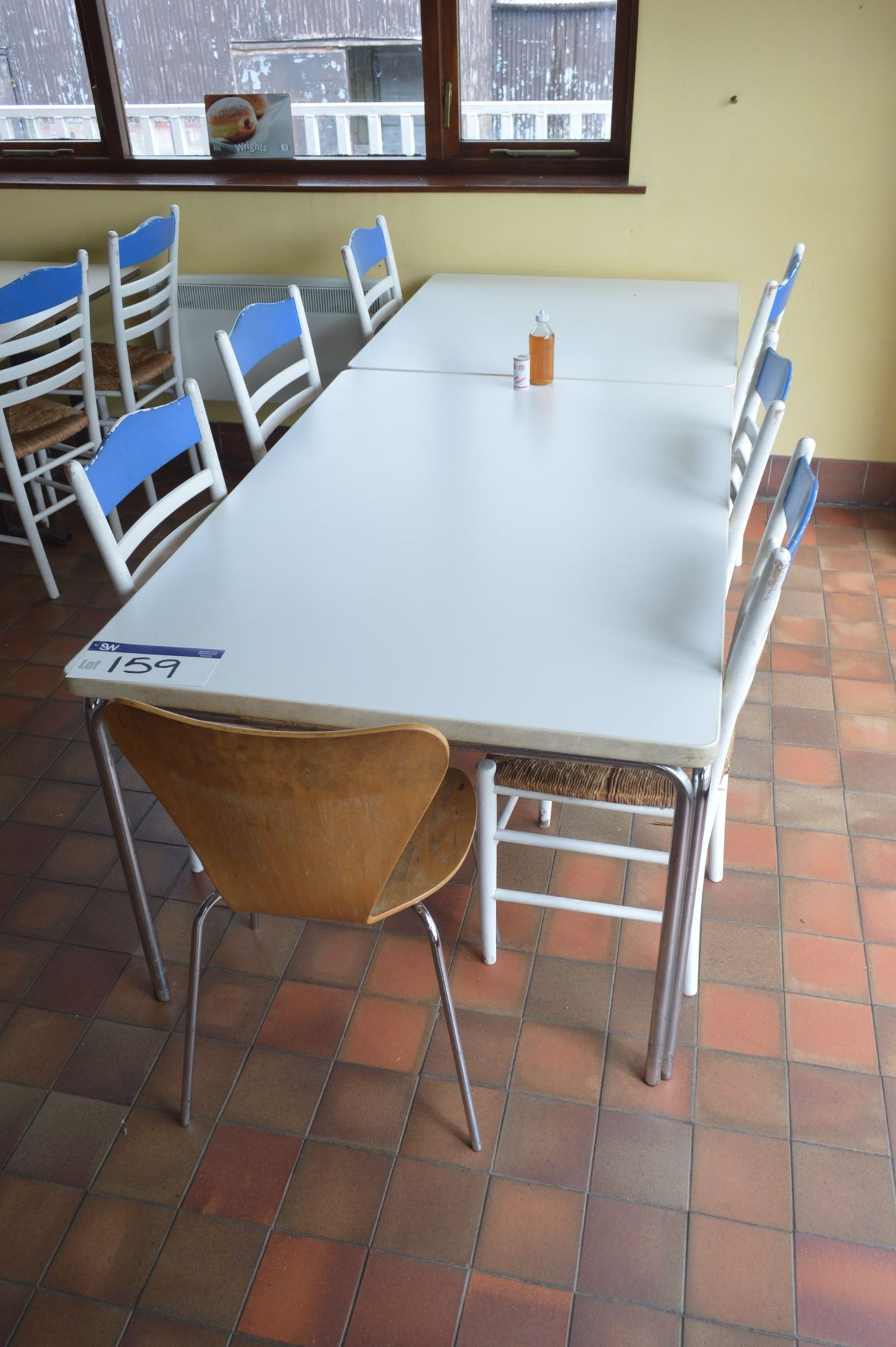 Two Steel Framed Canteen Tables, with seven mainly wood framed stand chairs