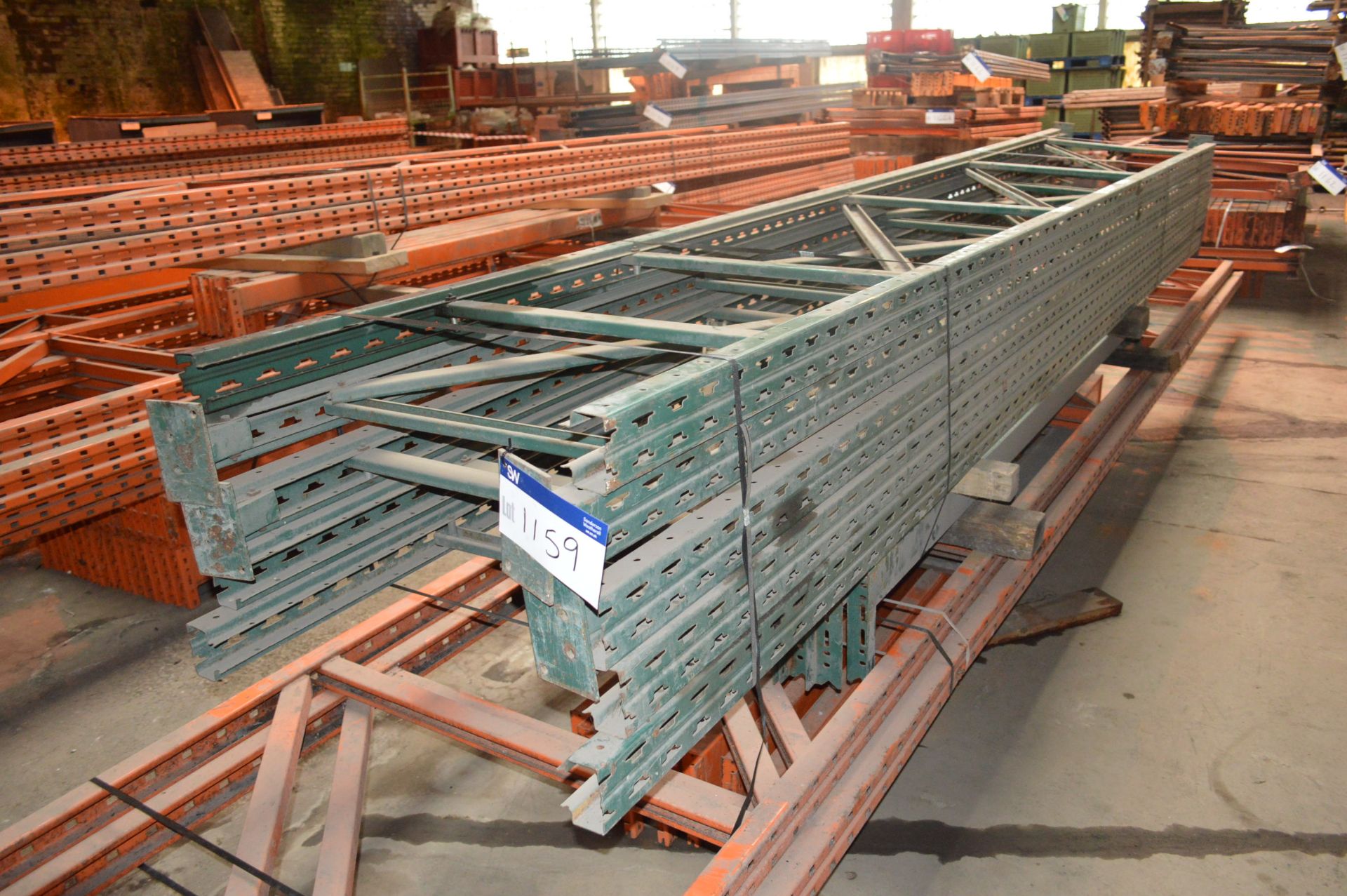 Five Pallet Racking Uprights, each approx. 800mm x 5m high, with approx. 13 cross beams