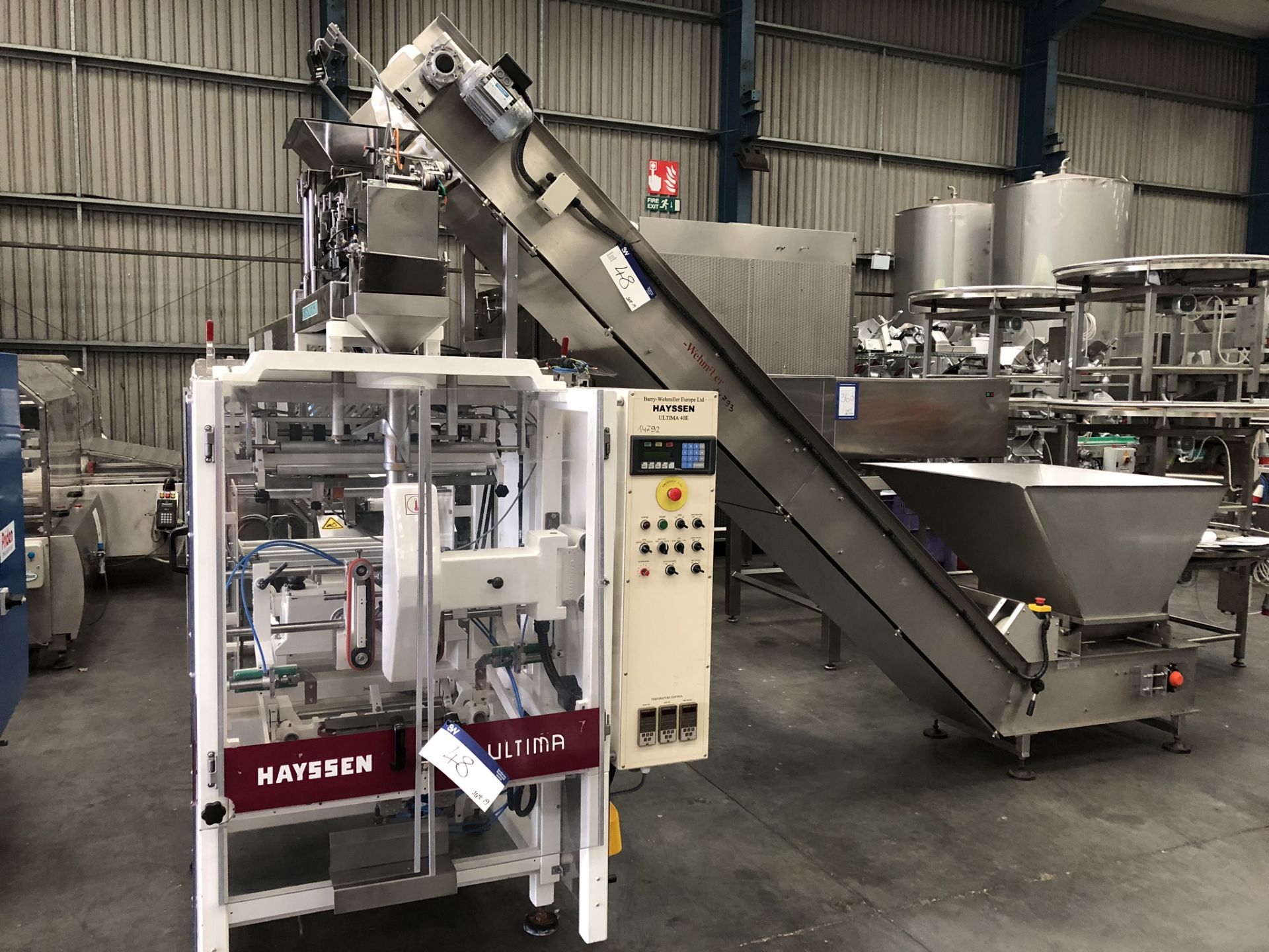Hayssen Ultima 40E FORM, FILL AND SEAL BAGGING LINE, with four filling tubes, 50mm, 90mm, 130mm, and