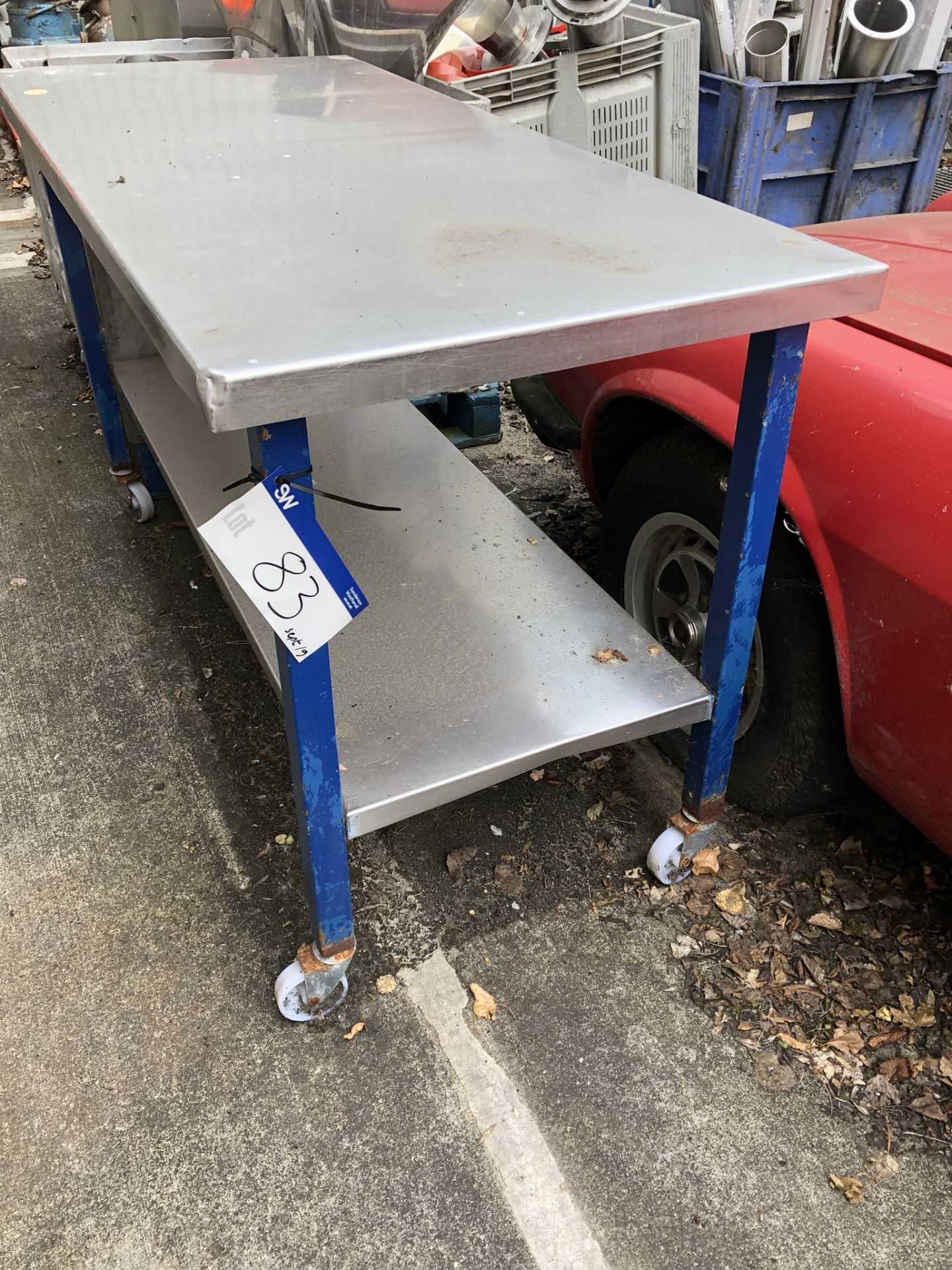 Mobile Table, with shelf, approx. 1.7m x 0.76m x 1m high, lift out charge - £20