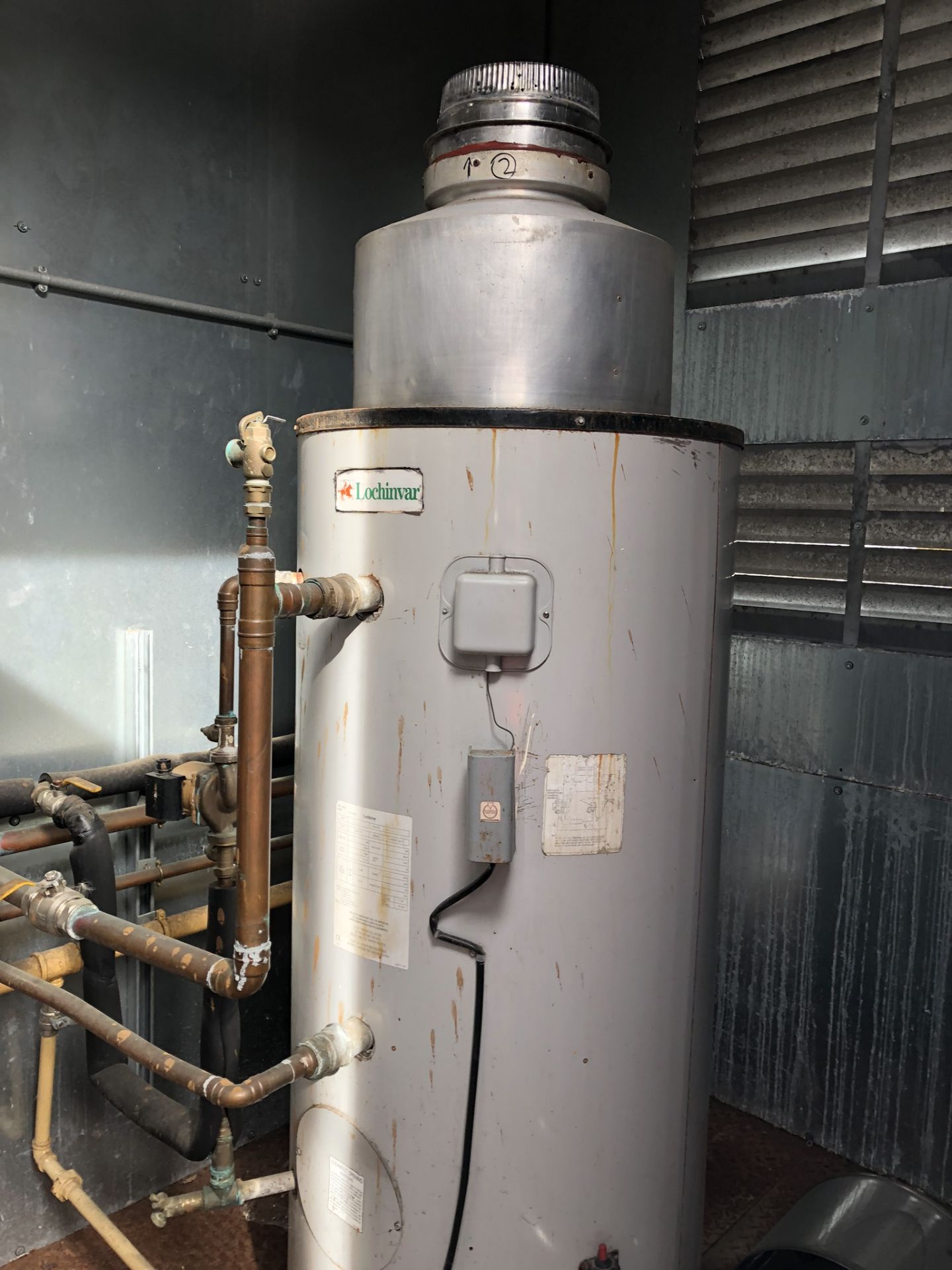 Two Lochnivar Gas Water Heaters, in container, with chimneys, lift out charge - £100 - Image 2 of 7