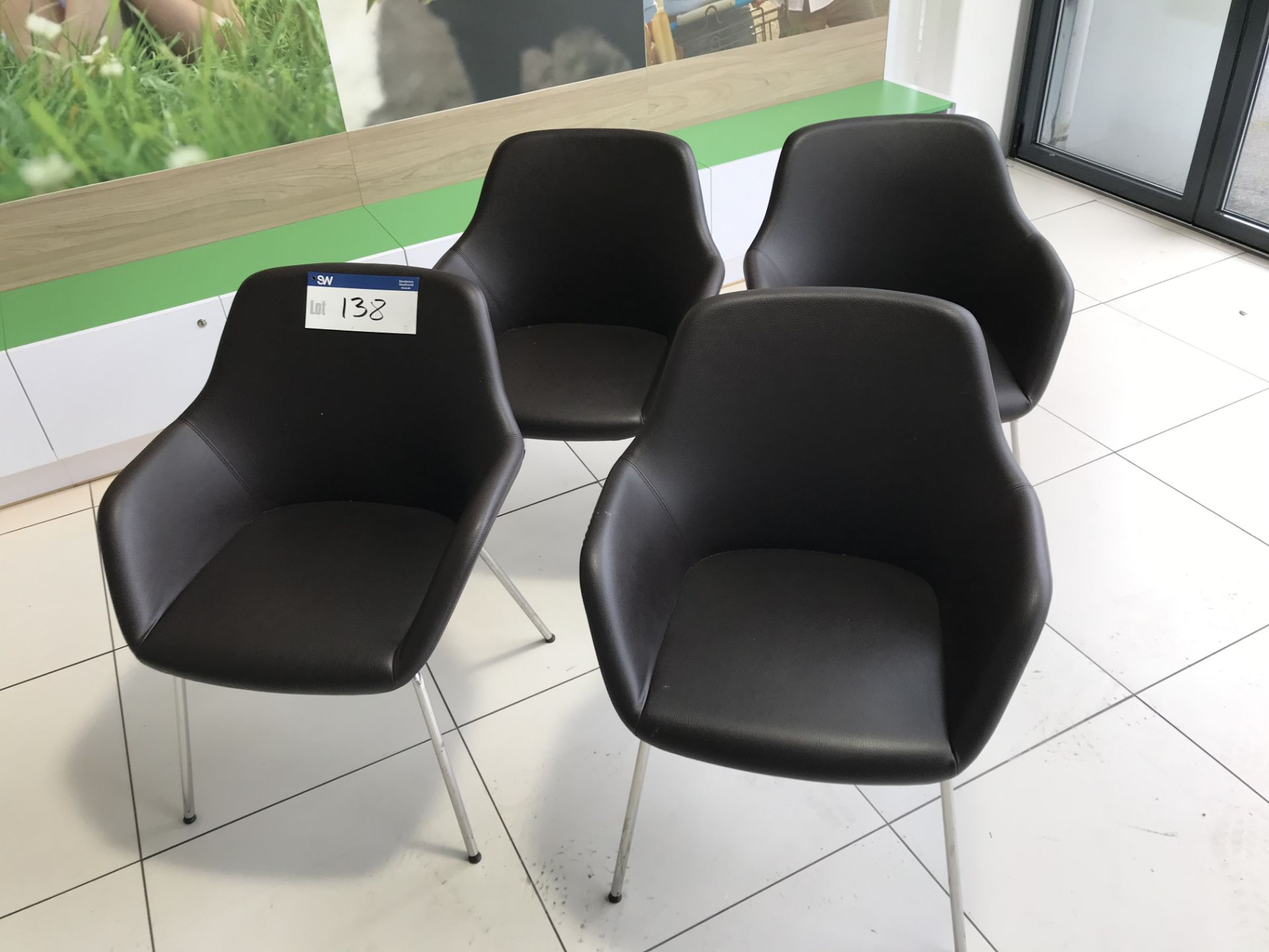 Four Chrome Framed Leather Upholstered Side Chairs