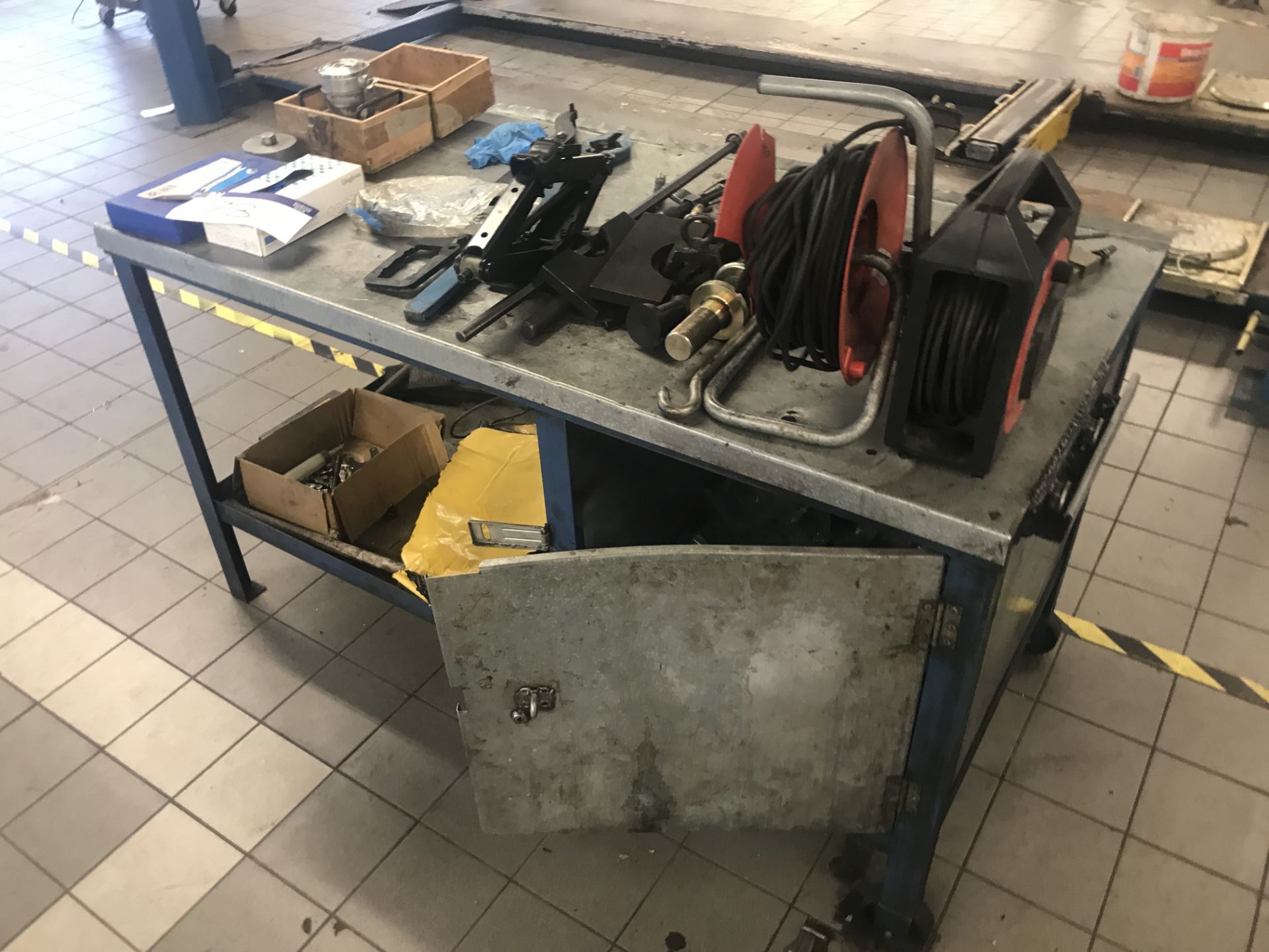 Steel Framed Mobile Workbench, with contents as set out including two extension reels and car jack - Image 2 of 2