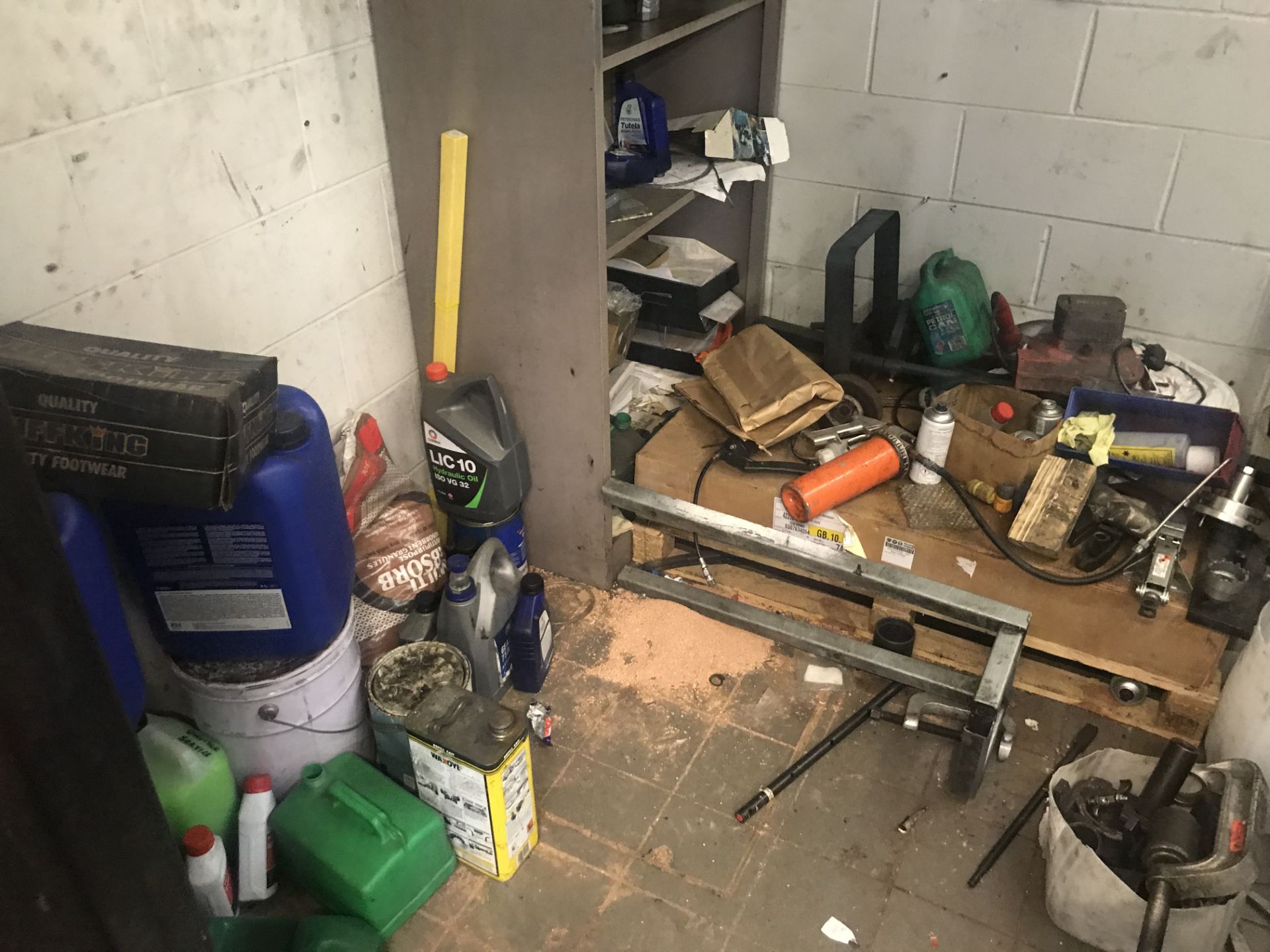 Contents of Store Room, including lubricants, plastic canisters, stock rack, trolley and vehicle - Image 2 of 5