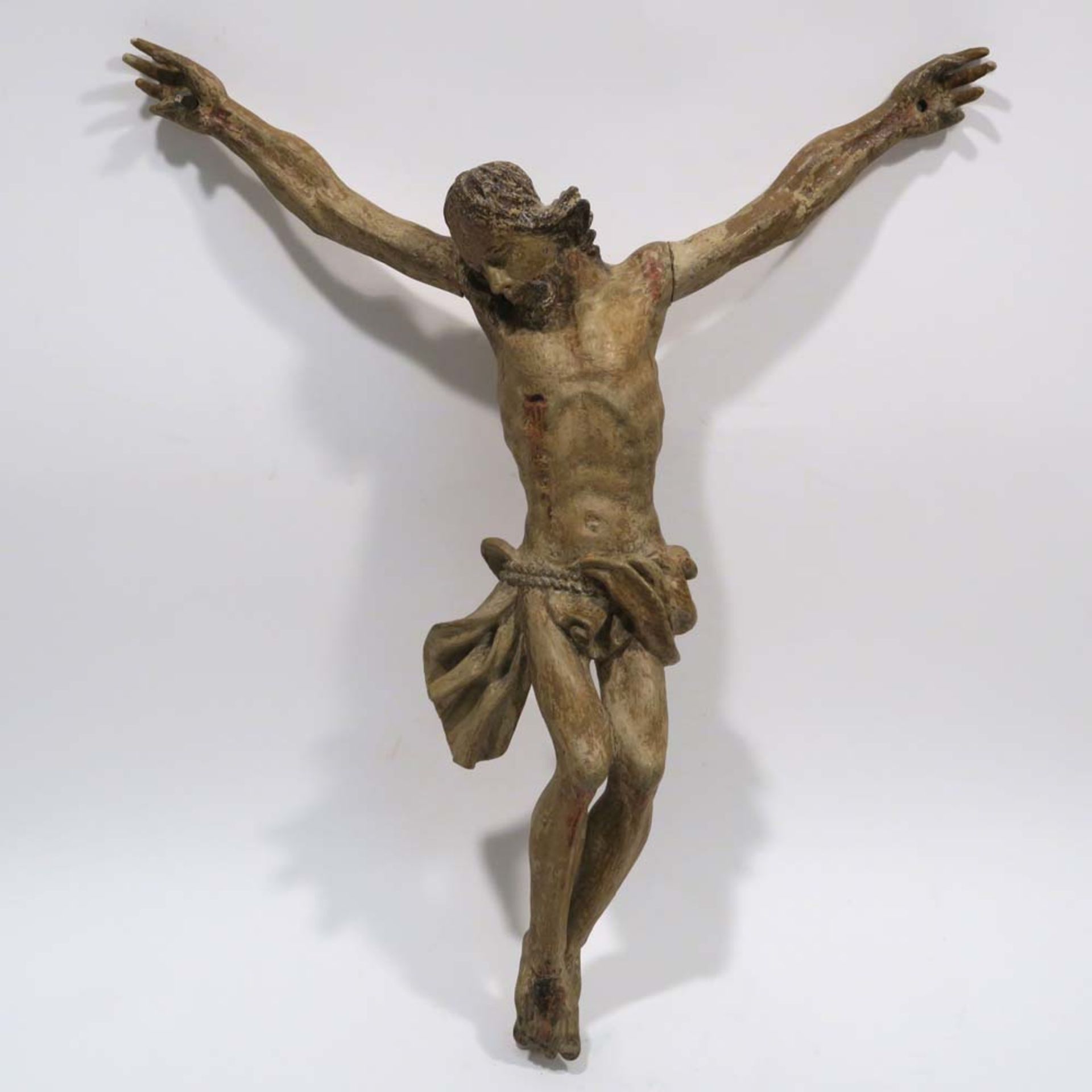 Christus-CorpusSüddeutsch, 18. Jh. Holz, geschnitzt, Fassungsreste. Min. besch. H. ca. 48 cm.