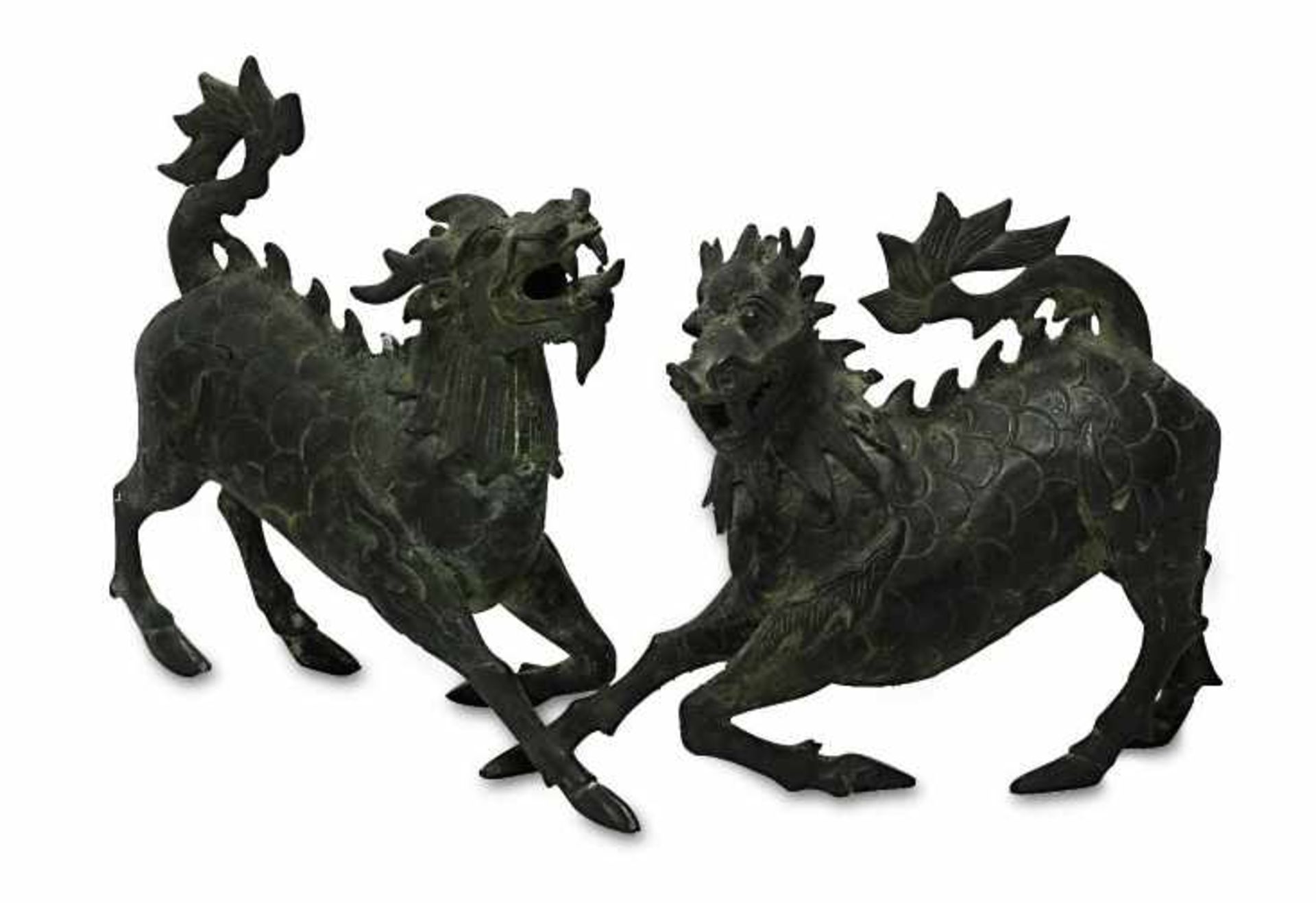 Zwei QilinChina Bronze. Besch. H. 18 cm und 21 cm