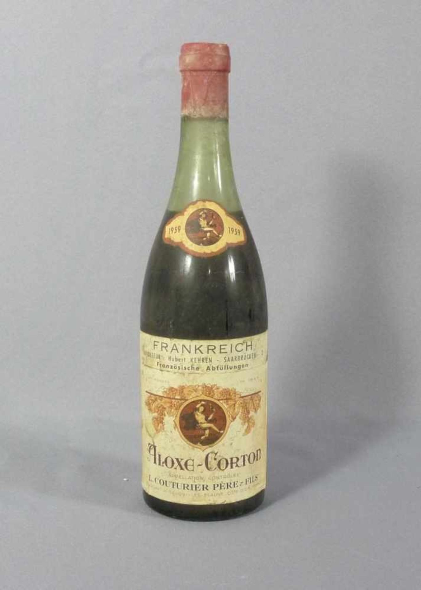 L. Couturier Père & FilsBurgundEine Flasche Aloxe-Corton von 1959, rote Kapsel. - Stark verschmutzt,
