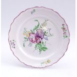 Flower plateStrasbourg, 19th c.Small, round form with multiple curved ''Baroque'' edge; large flower