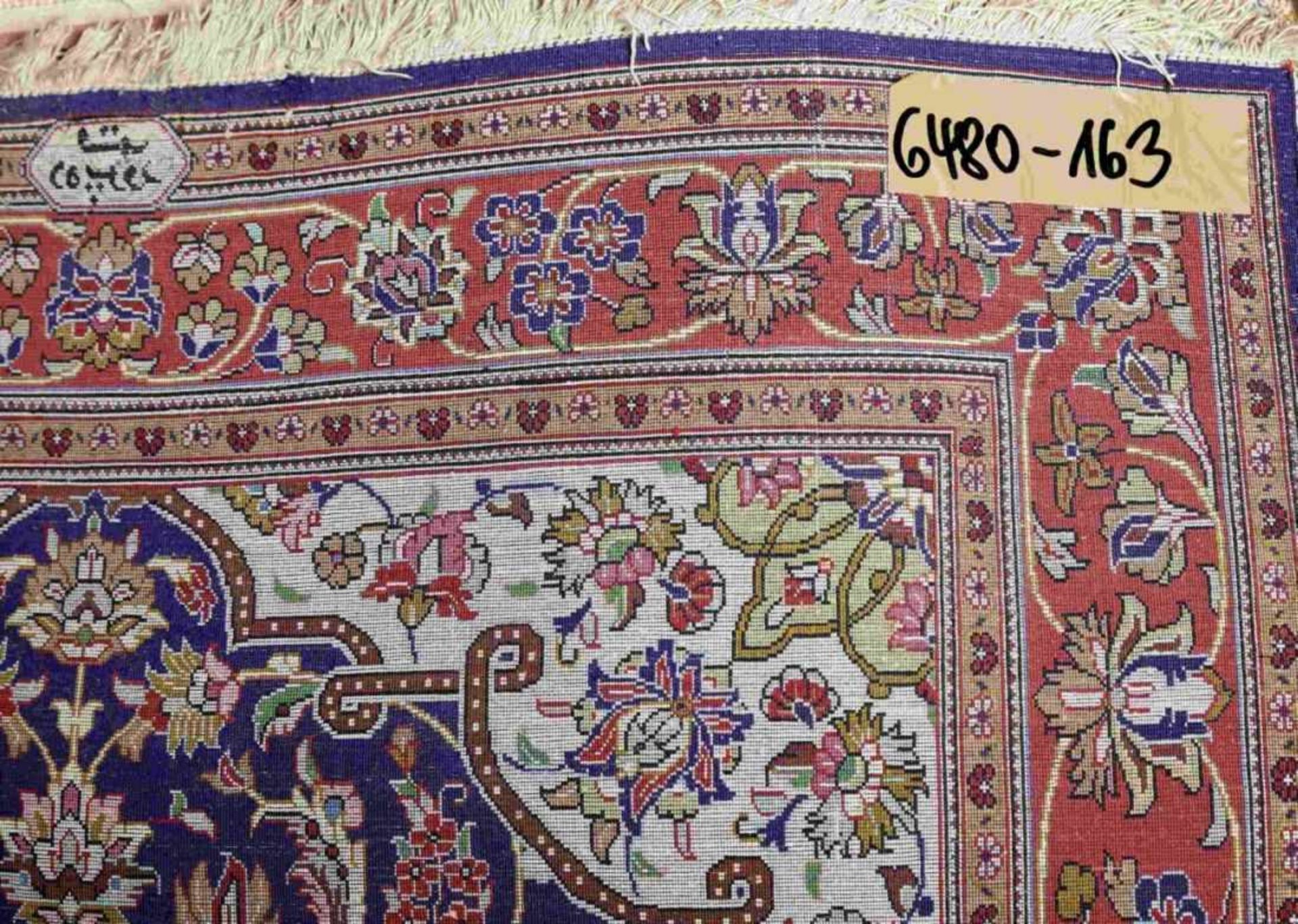 GhomIran, 20th c.In strong shades of blue and red, tendril border, centre field with large cartouche - Bild 4 aus 4