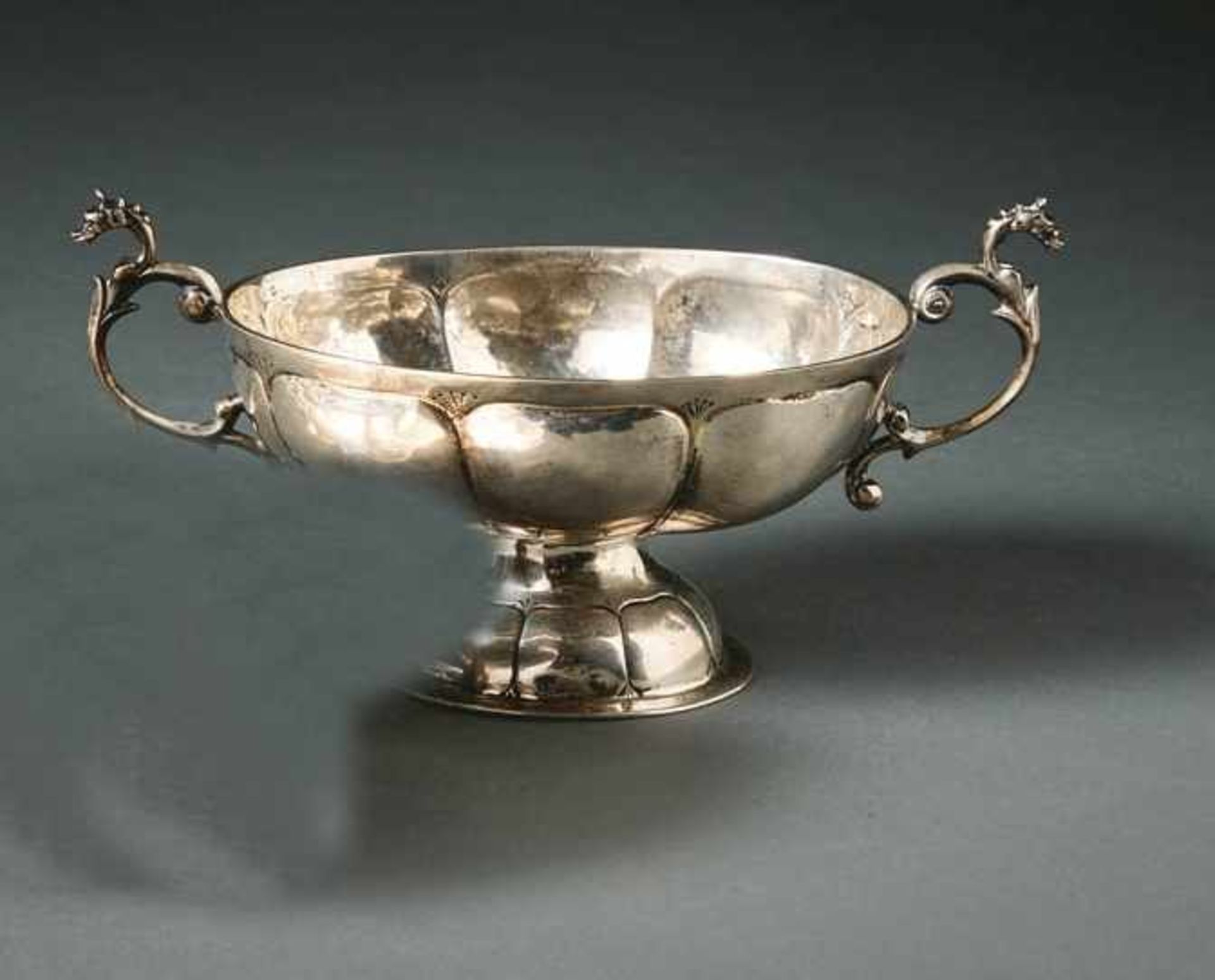 Small bowl with handle19th centuryOval foot and oval bowl with buckle decoration, two raised