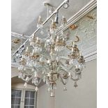 Large chandelierMurano, 20th c.On richly structured glass balusters on four levels a total of 24